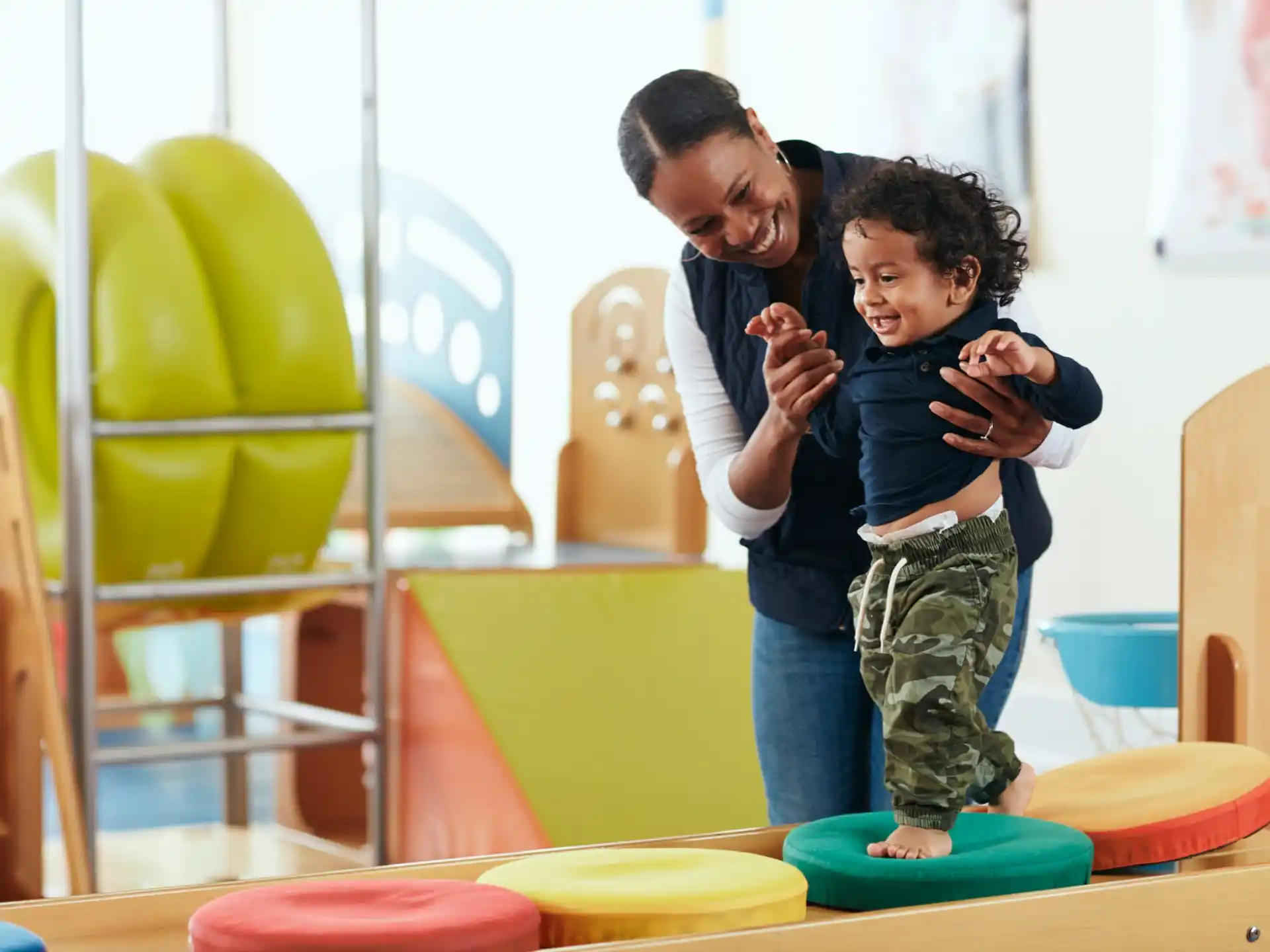 a person and a child playing