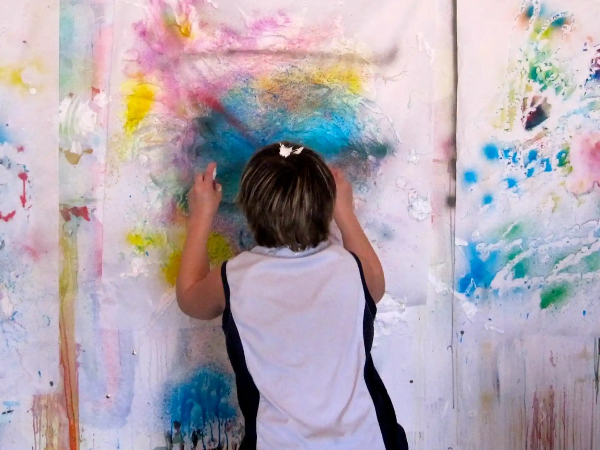 a person painting a wall