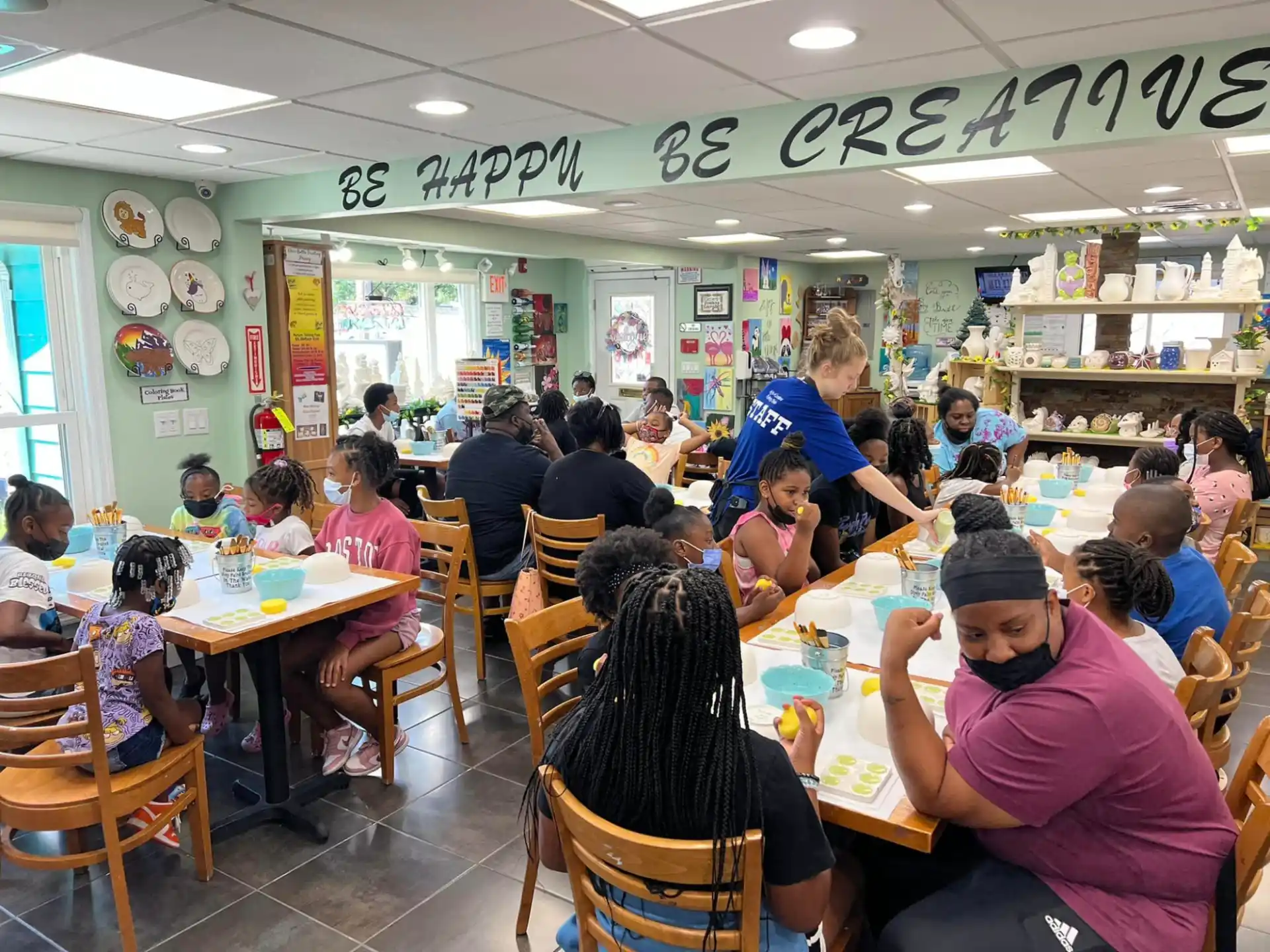 a group of people sitting at tables