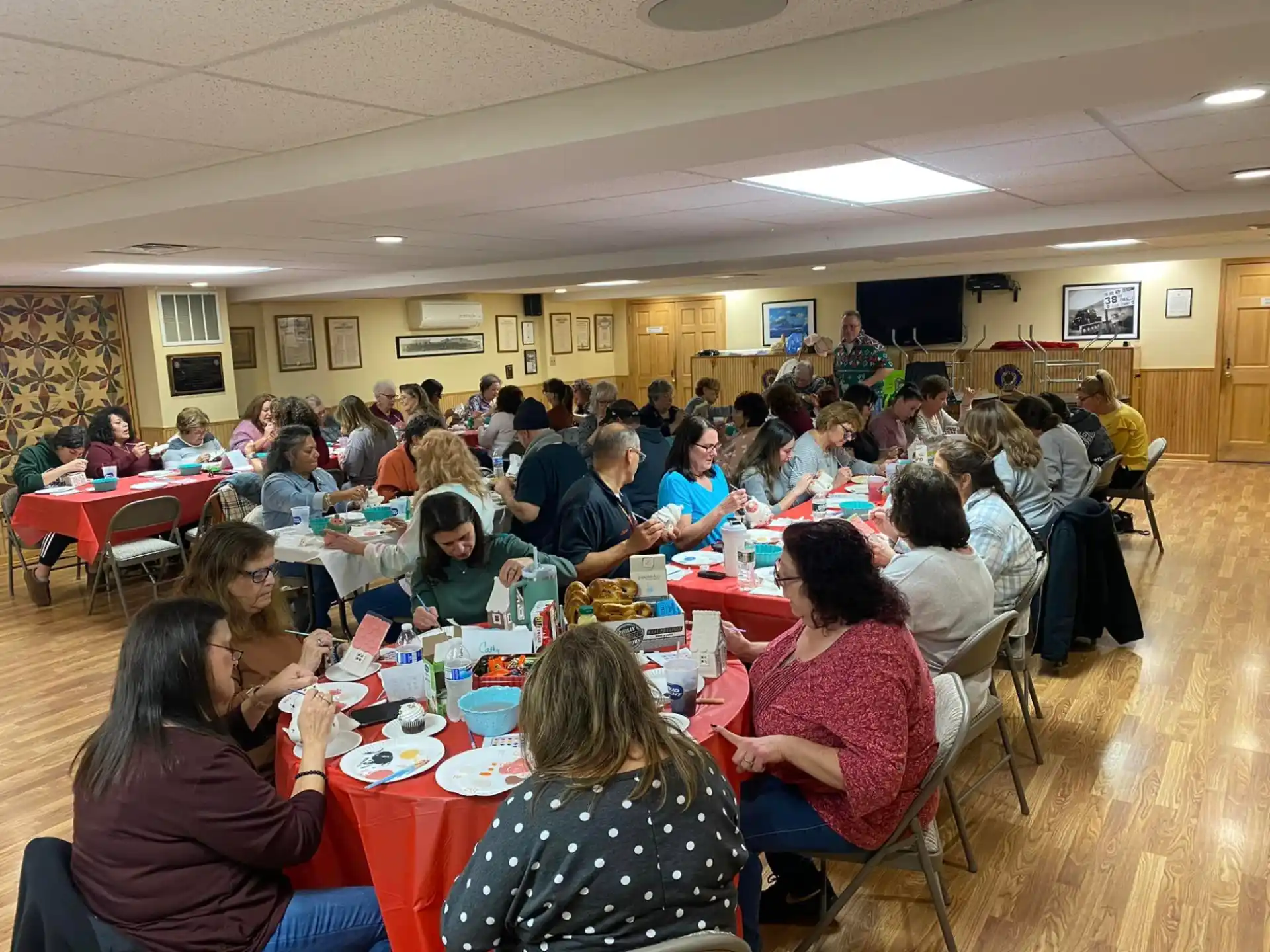 a group of people sitting at tables