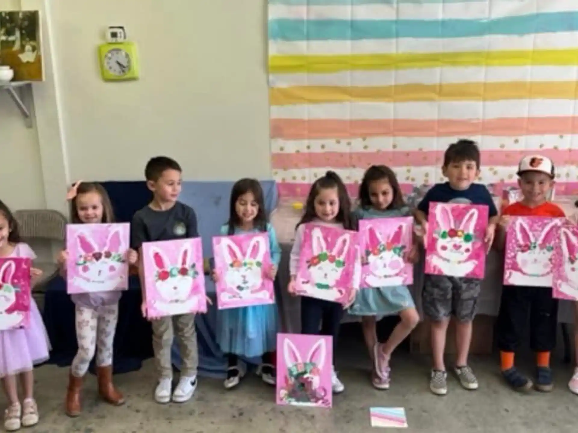 a group of children holding signs