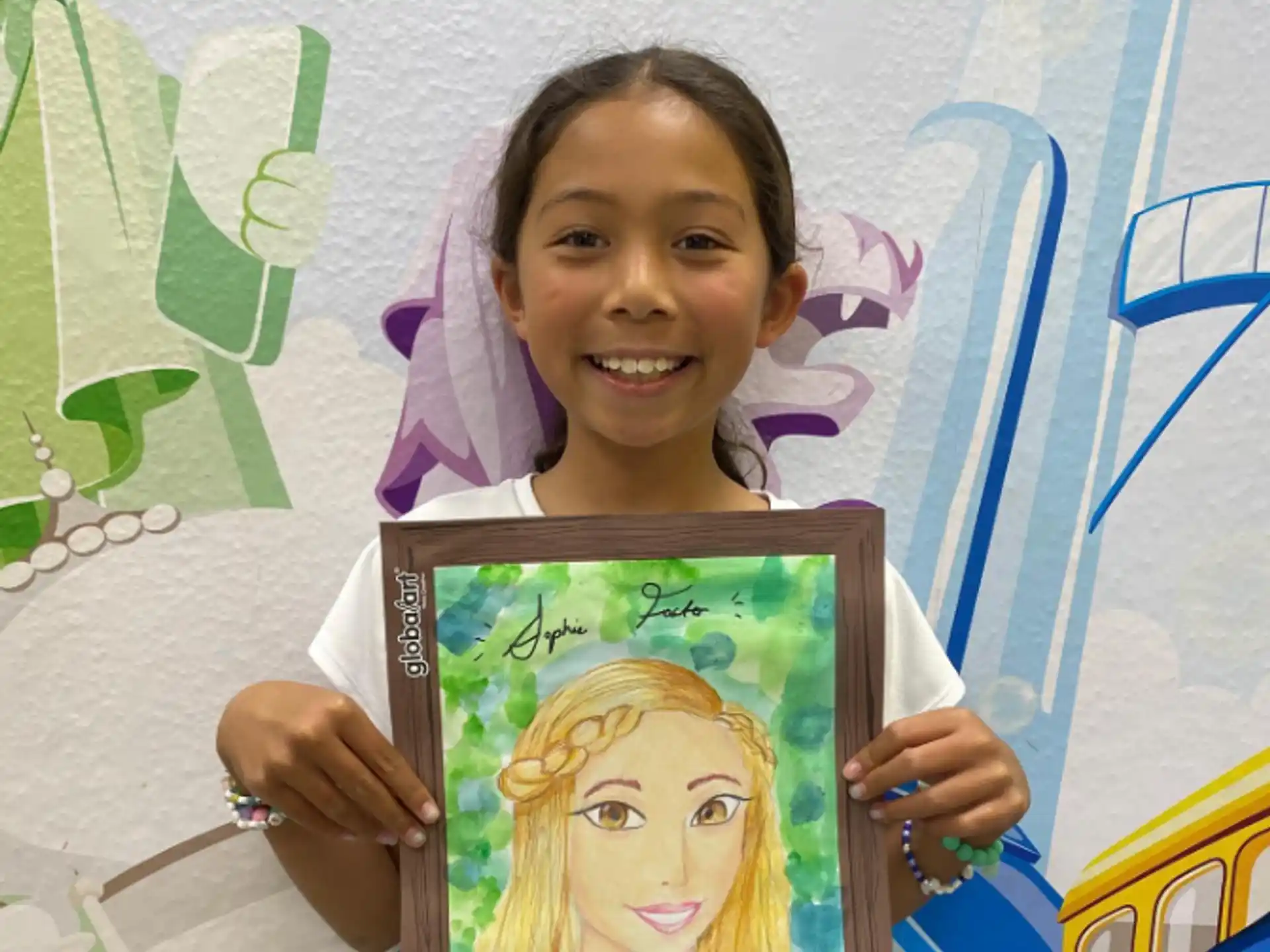 a girl holding a book