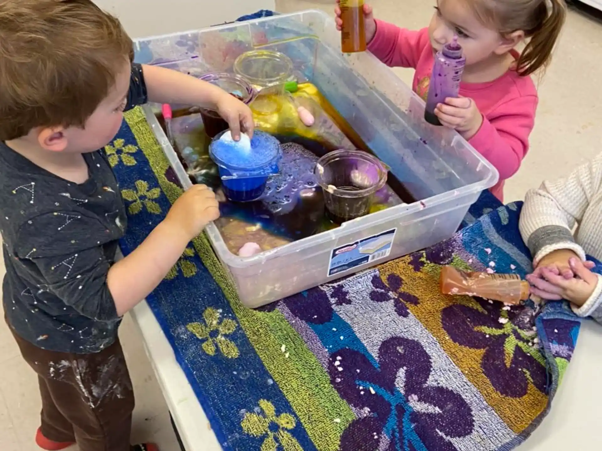 children playing with a toy