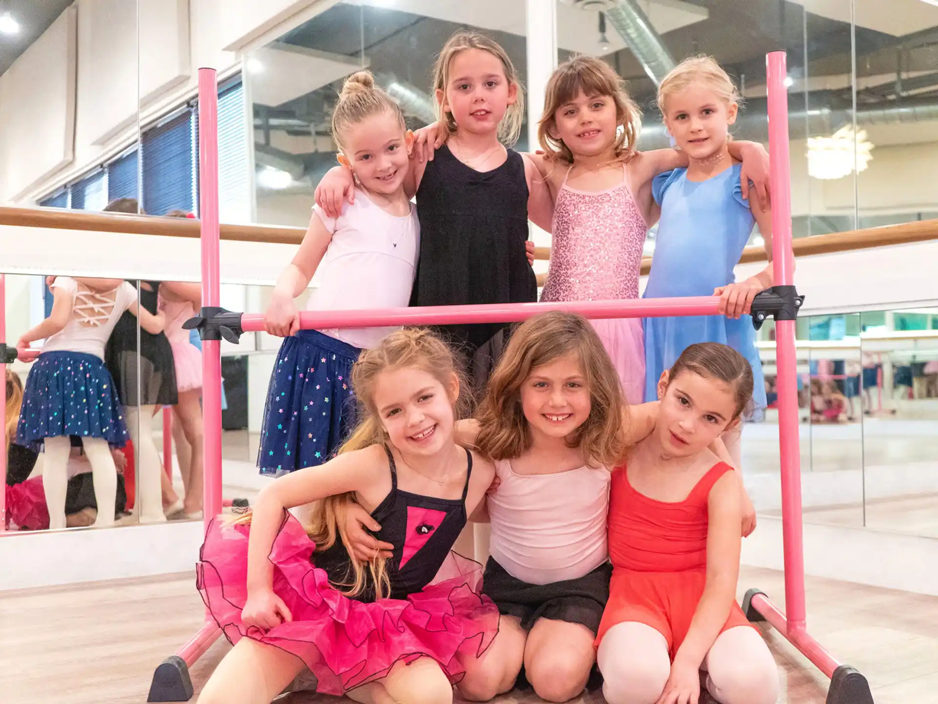 a group of girls posing for a photo