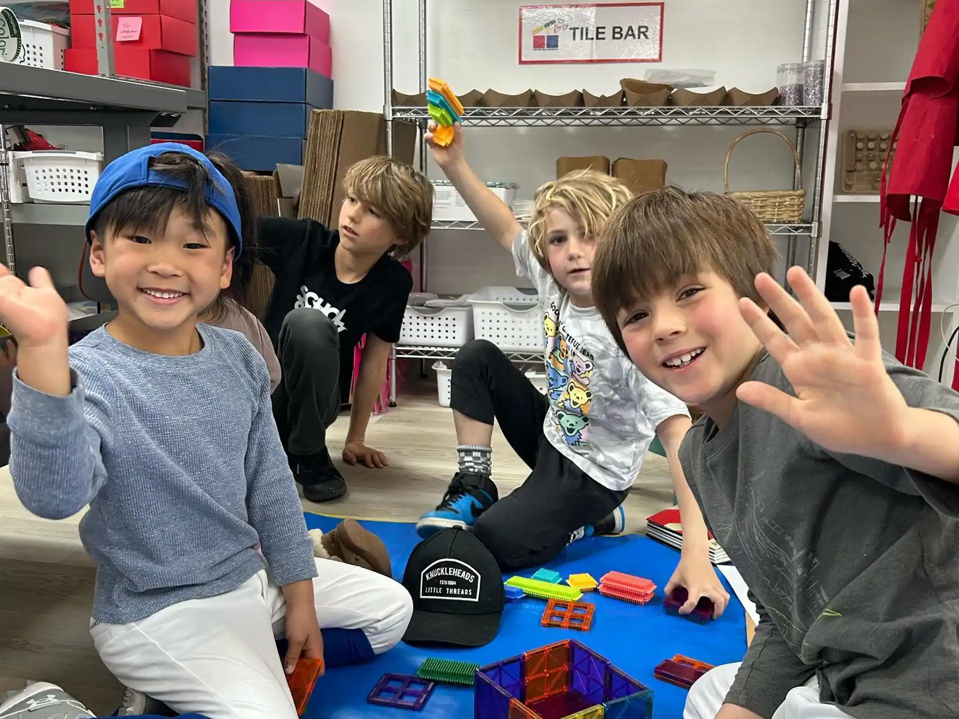 a group of kids playing with toys