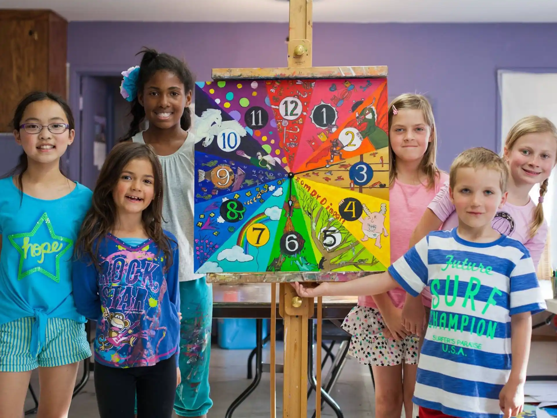 a group of children posing for a photo