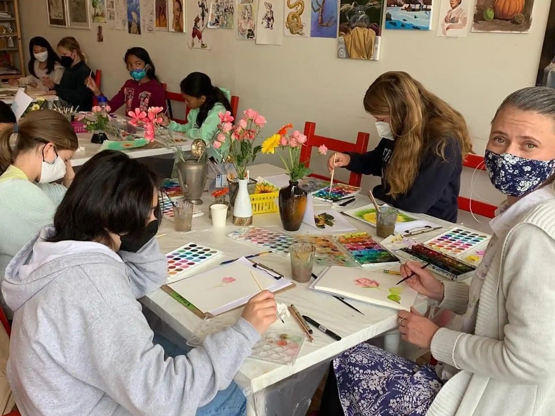a group of people sitting at a table
