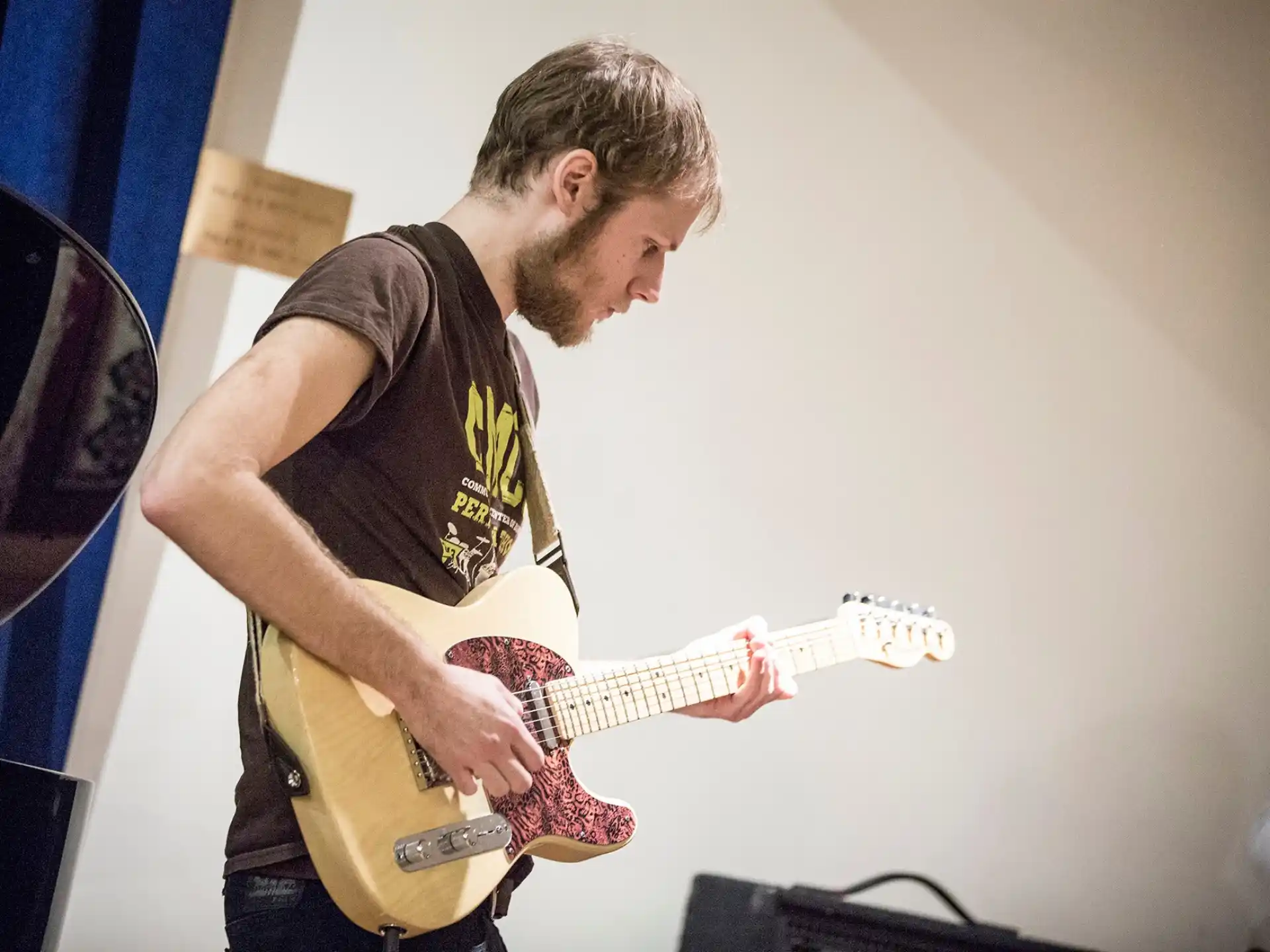 a man playing a guitar