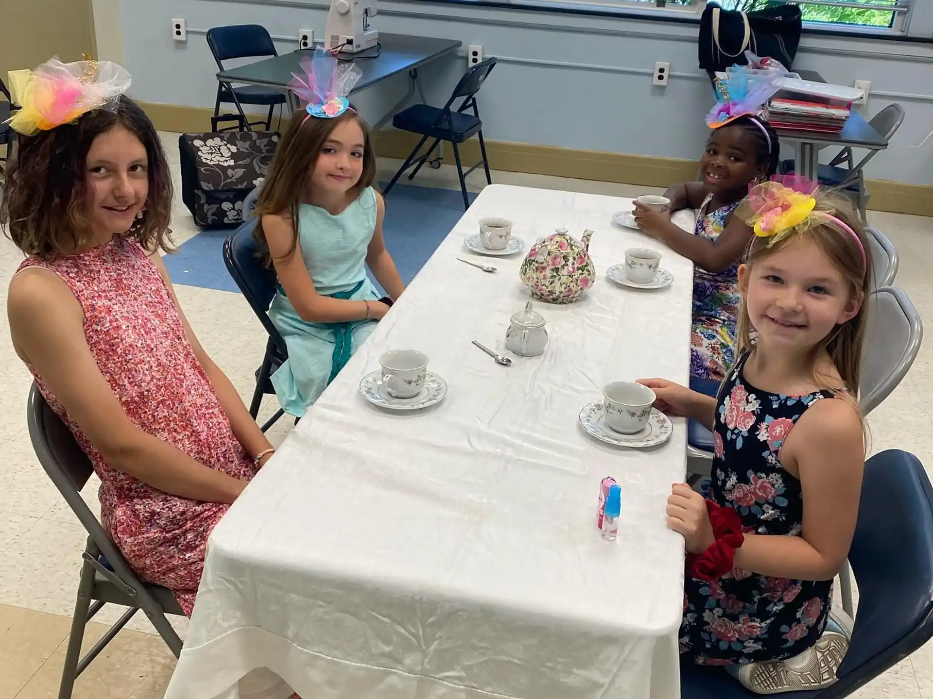 a group of women sitting at a table