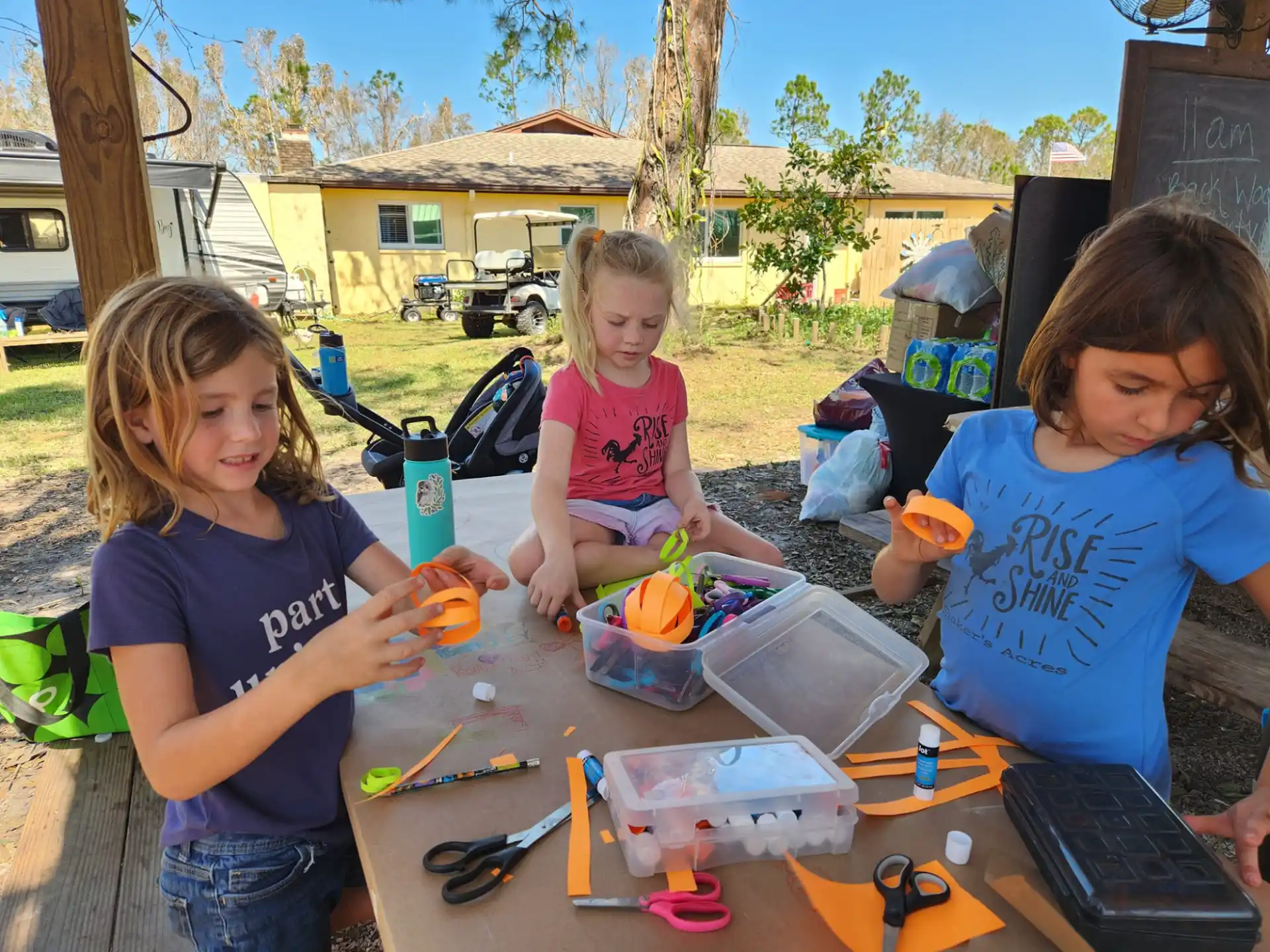 a group of children painting