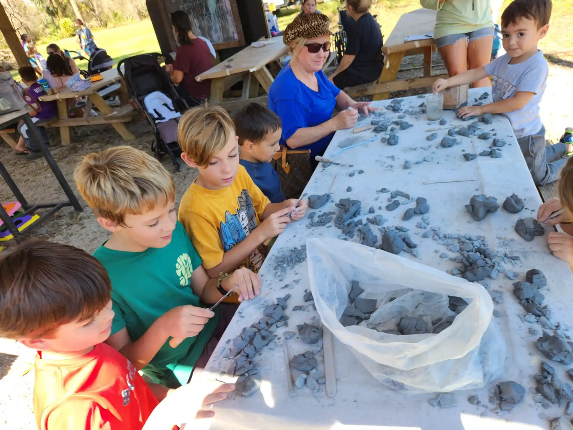 a group of children playing with sand