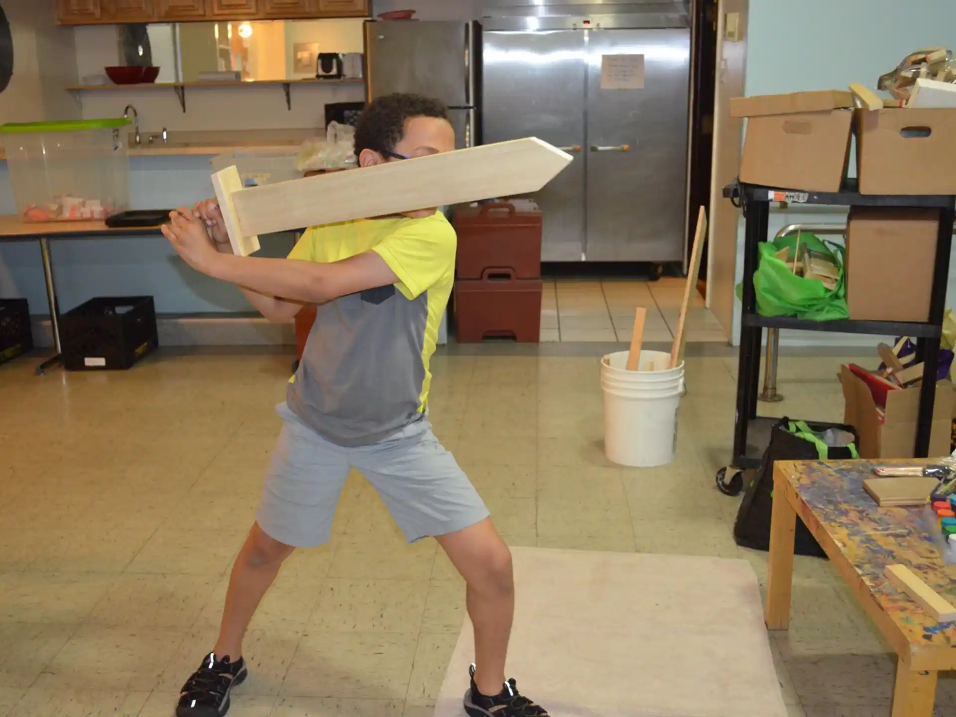 a man holding a yellow object