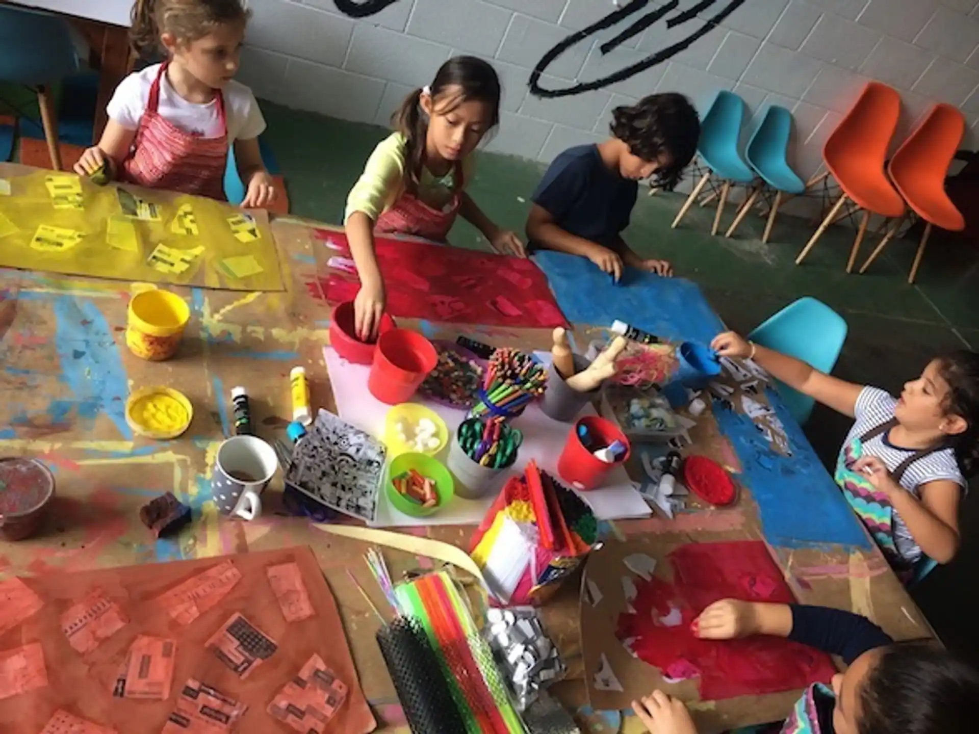 a group of children playing with toys