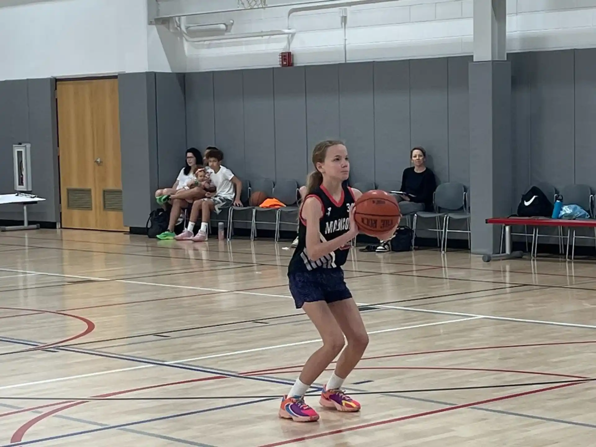 a girl playing basketball