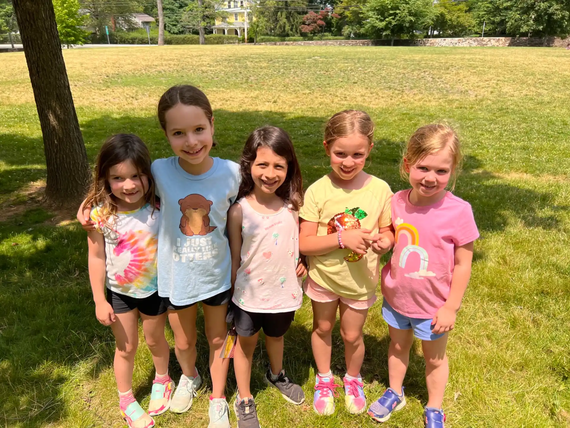 a group of girls posing for a picture
