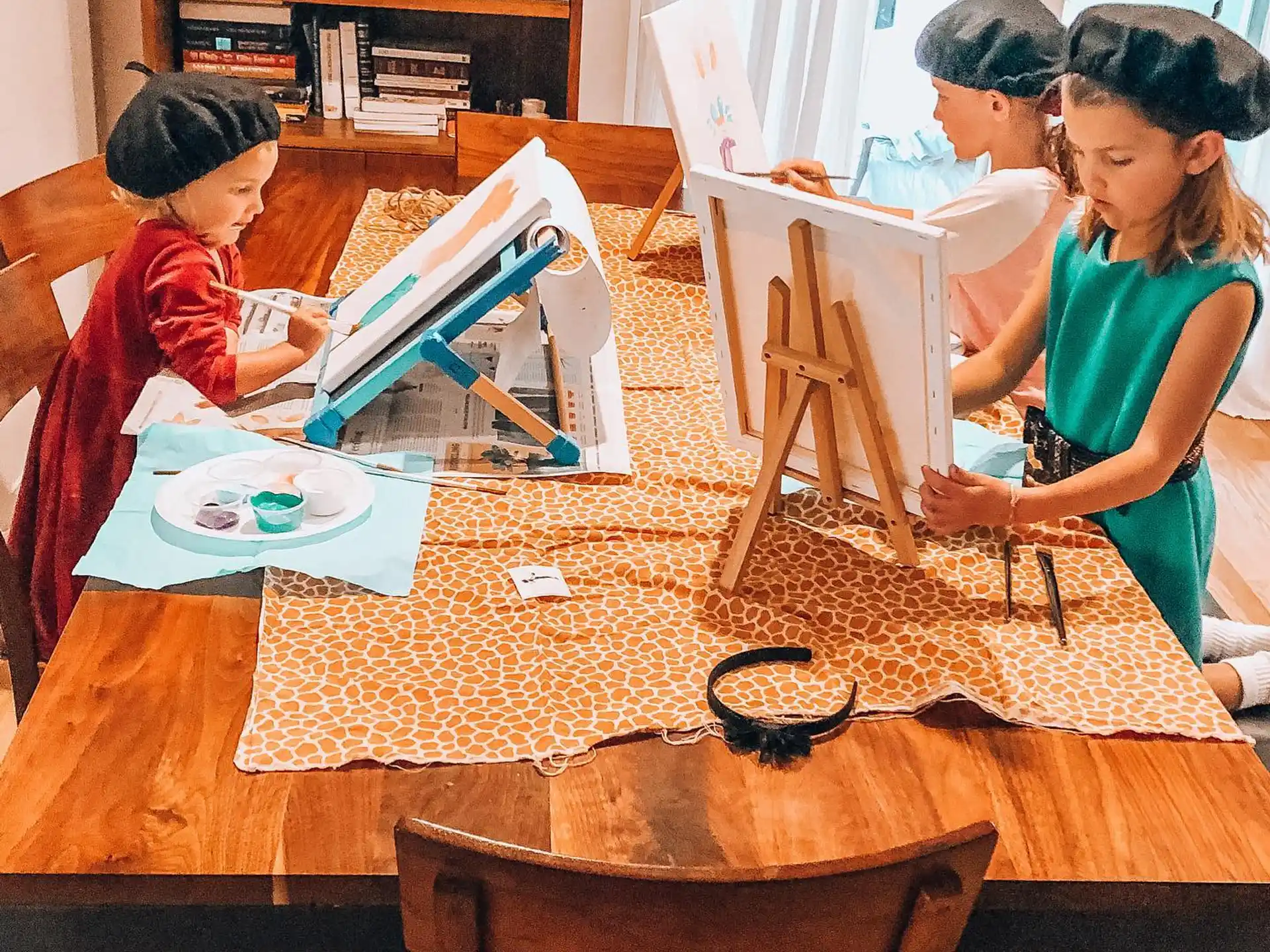 a group of children painting