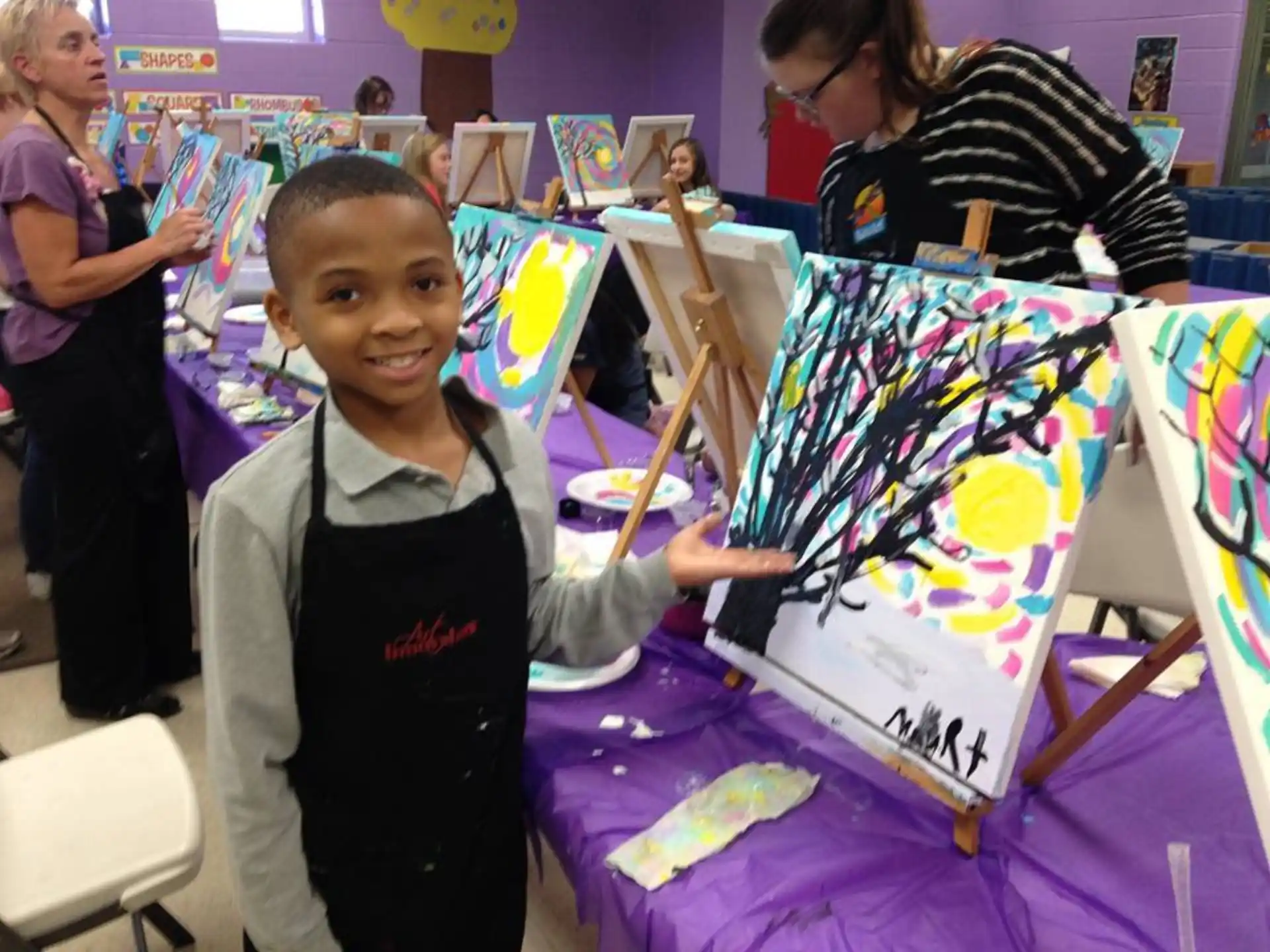 a boy holding a kite
