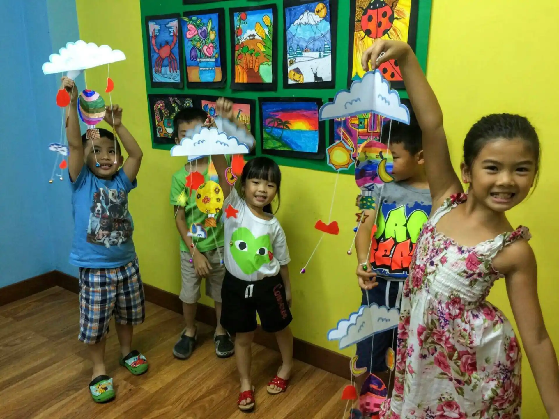 a group of children wearing party hats
