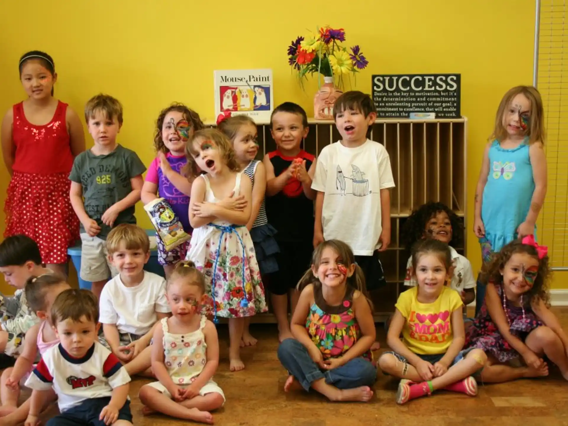 a group of children posing for a photo