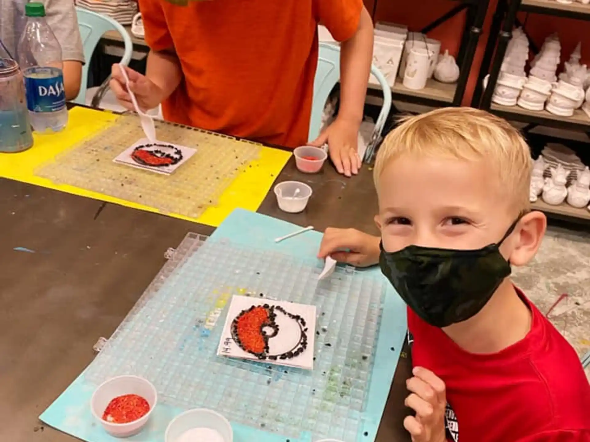 a couple of kids painting