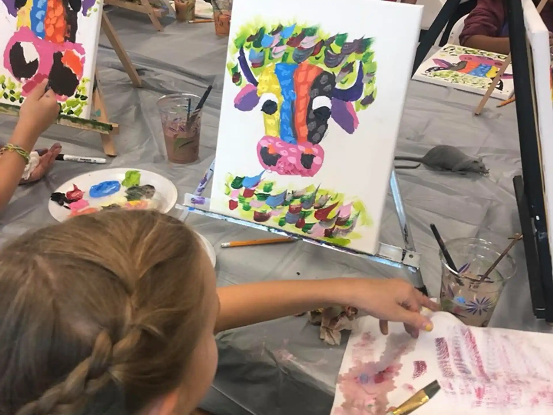 a group of people painting