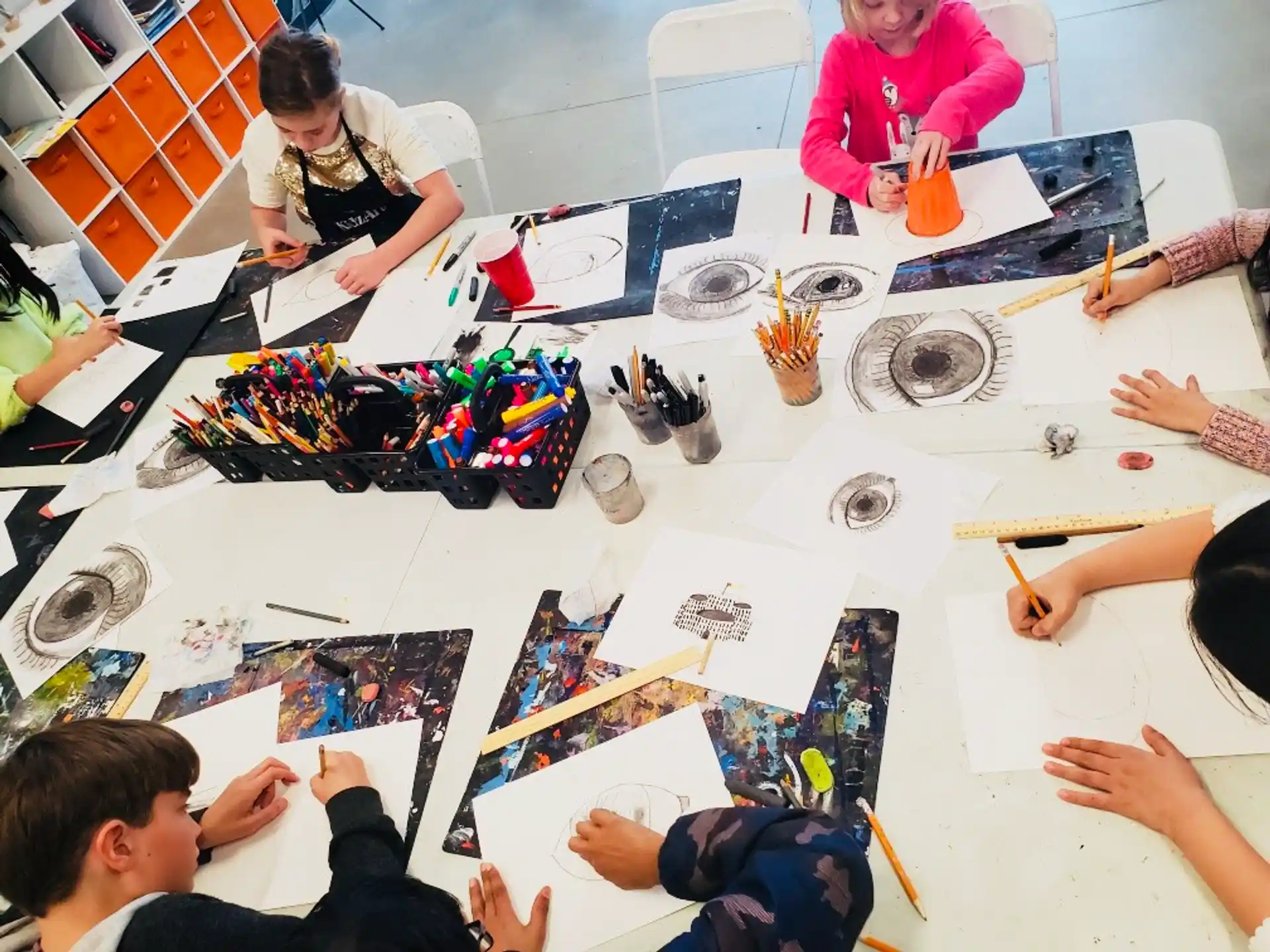a group of people sitting around a table with a board game