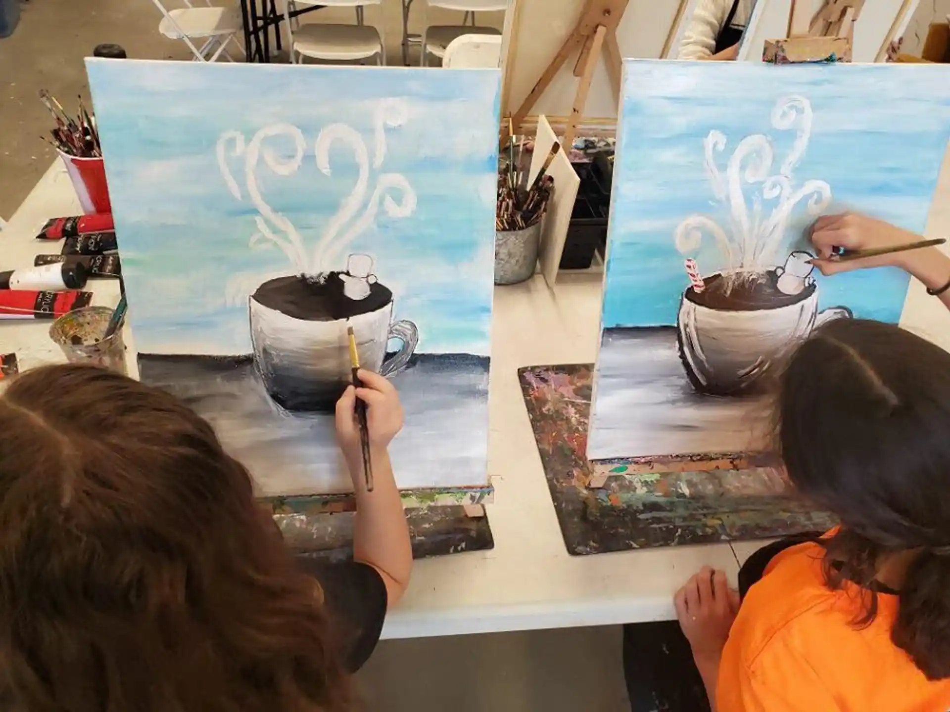 children drawing on paper