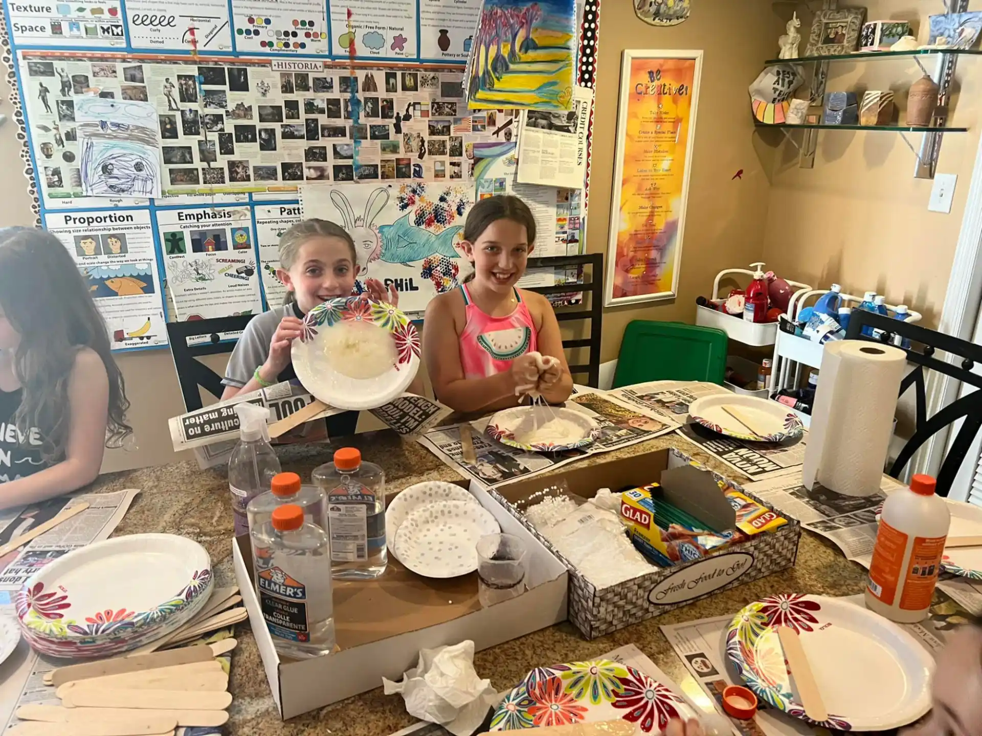 a couple of kids eating cake