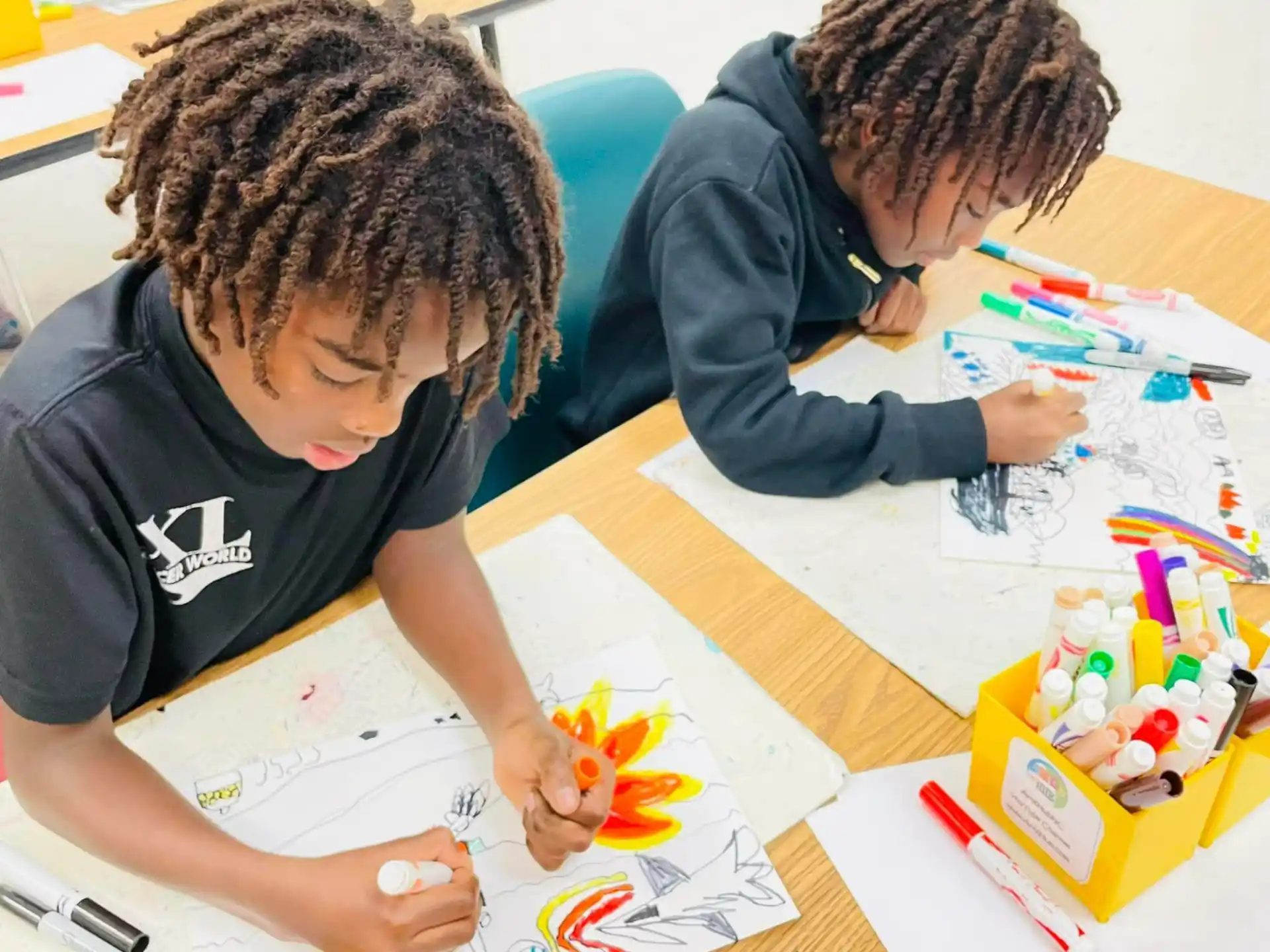 a couple of boys painting