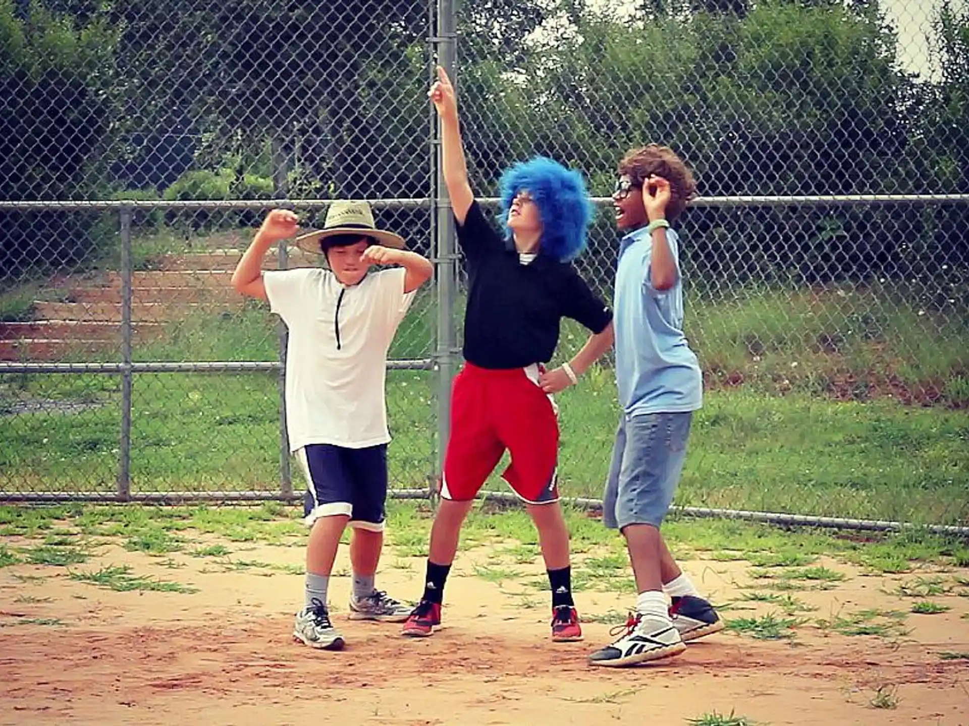 a group of people on a baseball field