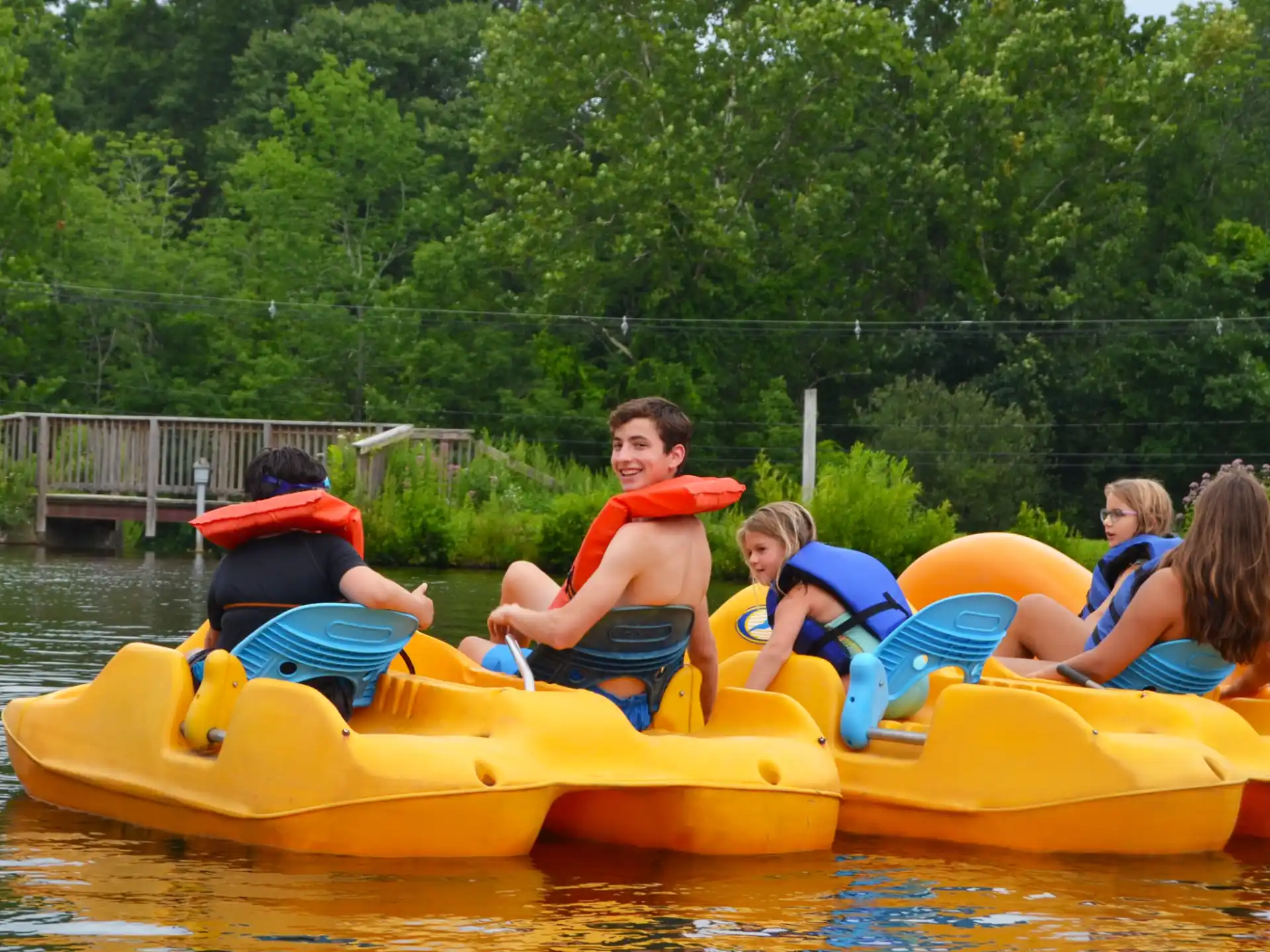 a group of people in inner tubes
