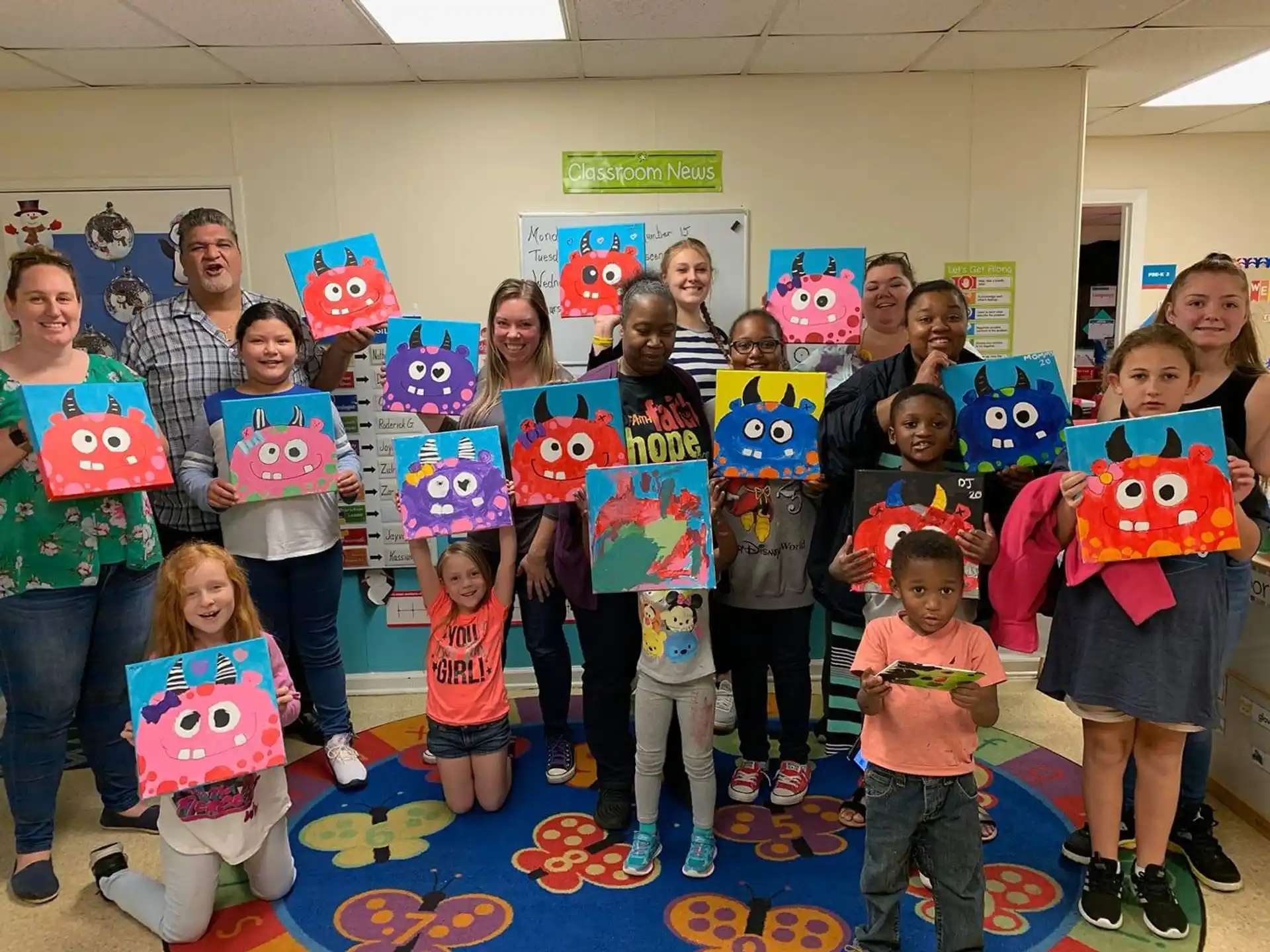 a group of children holding up signs