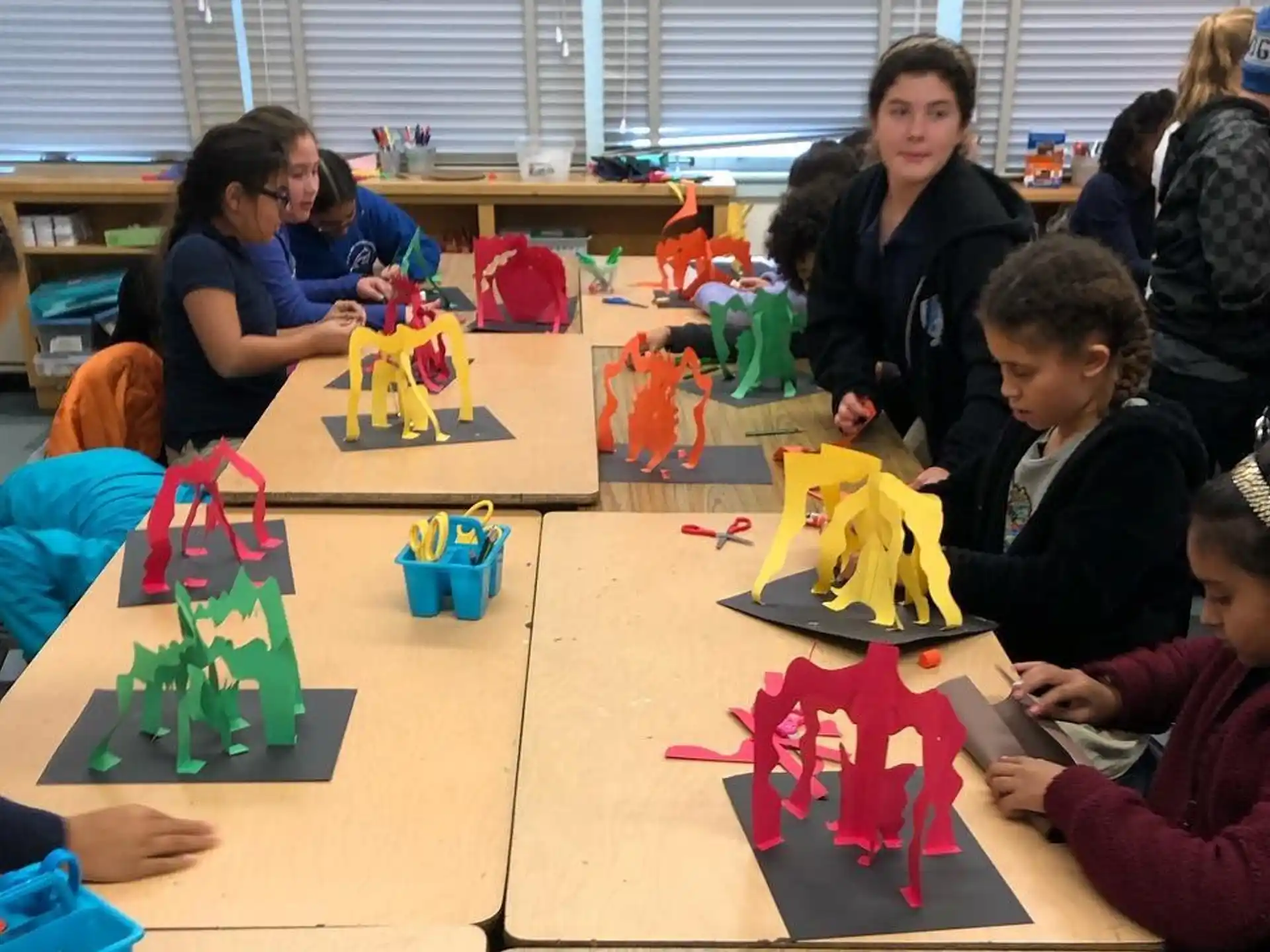 a group of children playing with toys
