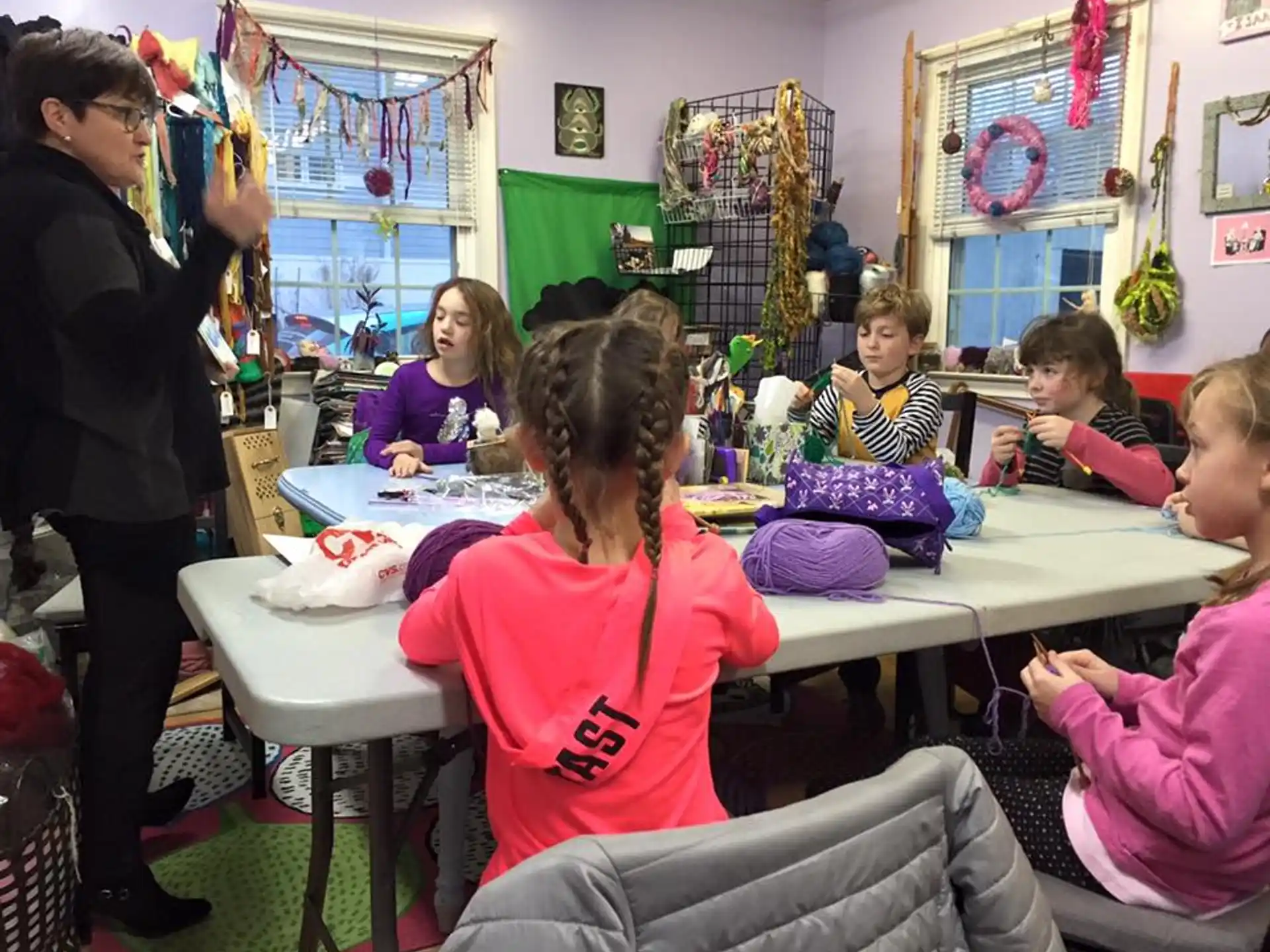 a group of people sitting at tables