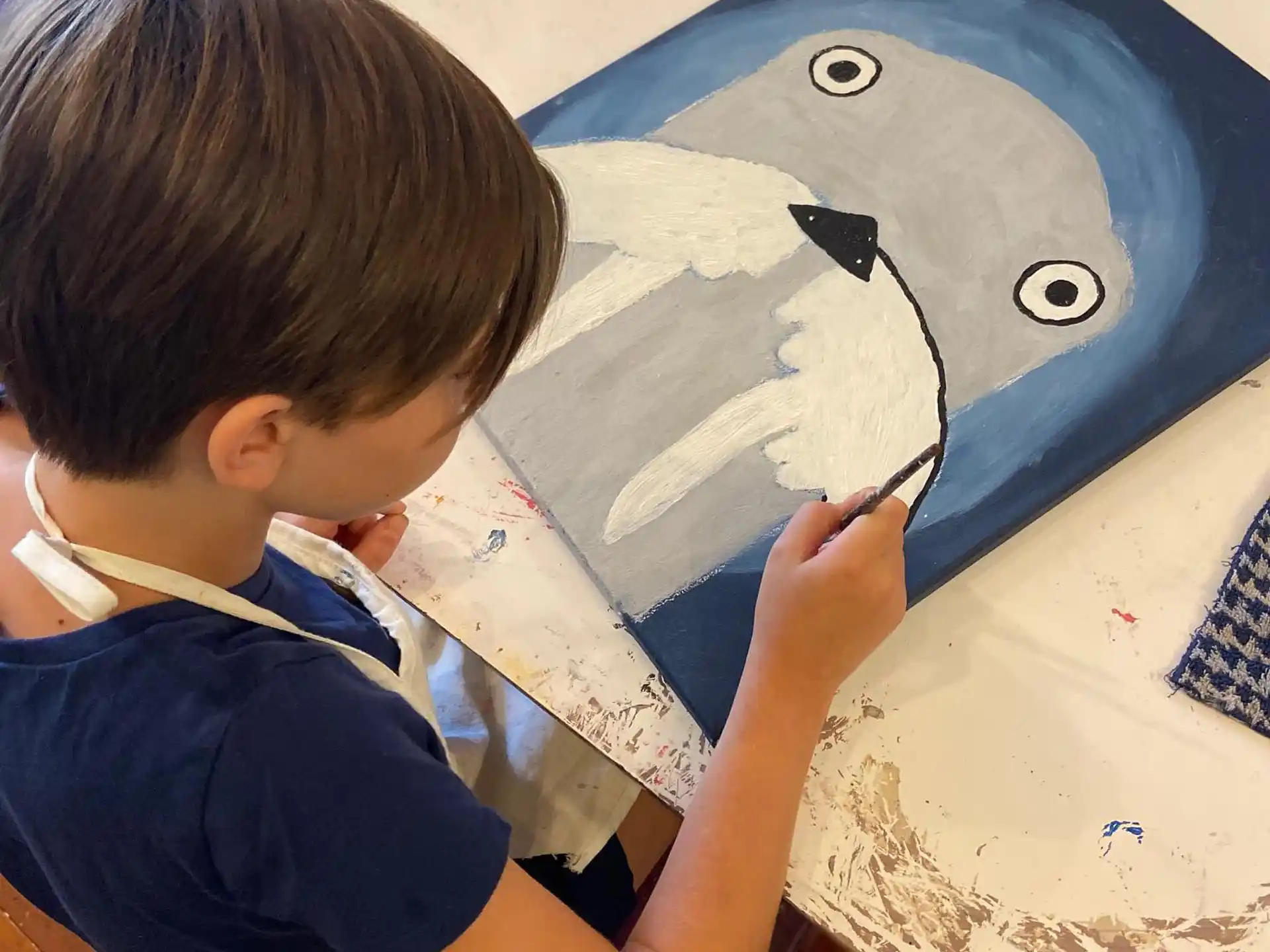 a child painting a picture