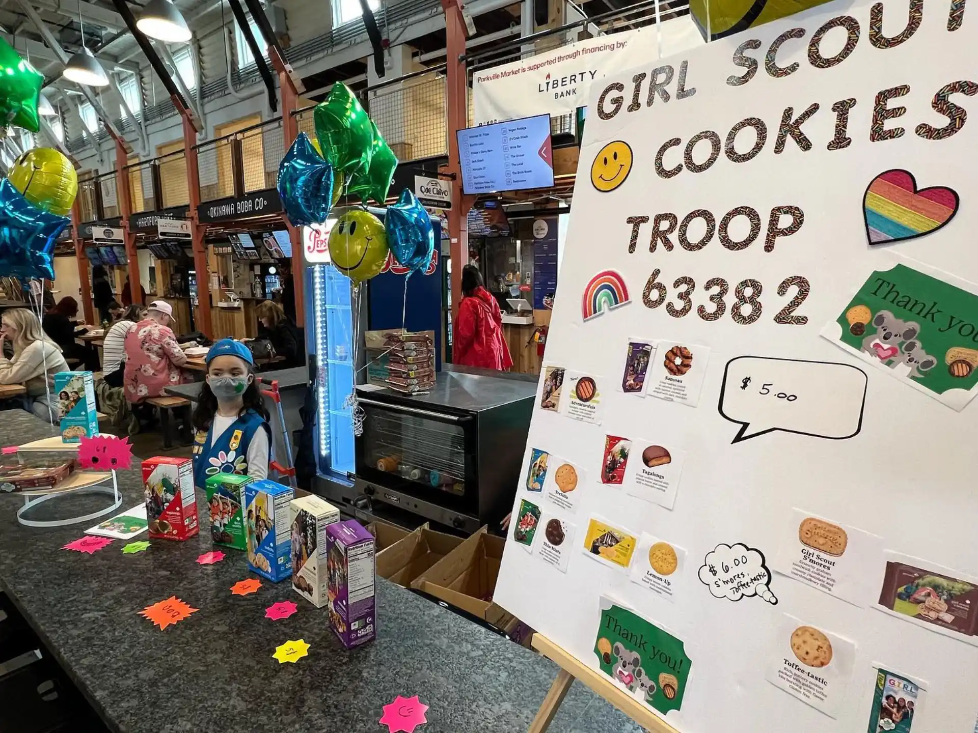 a store with a sign and toys