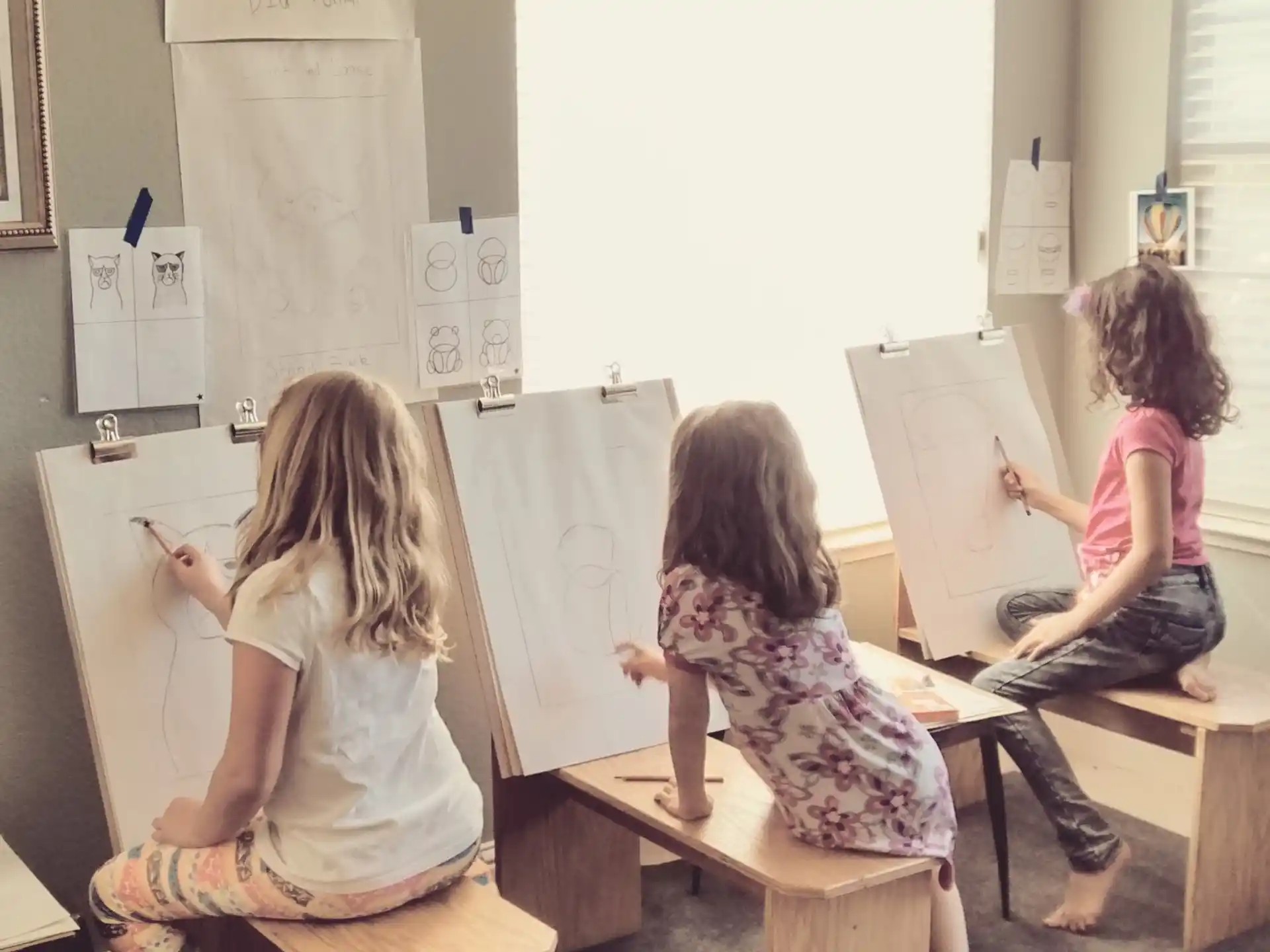 a group of girls painting