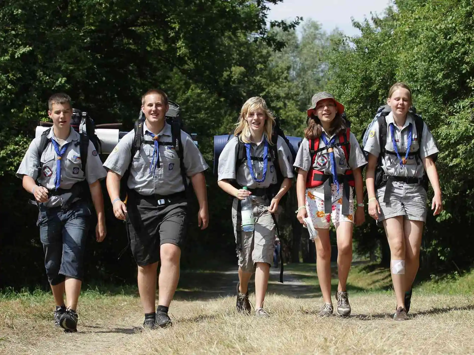 a group of people wearing backpacks