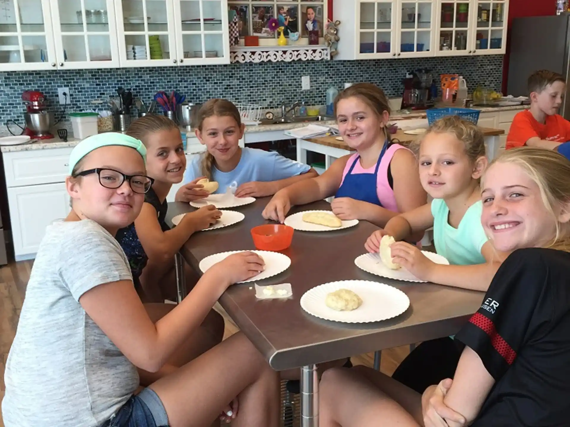 a group of people eating at a table