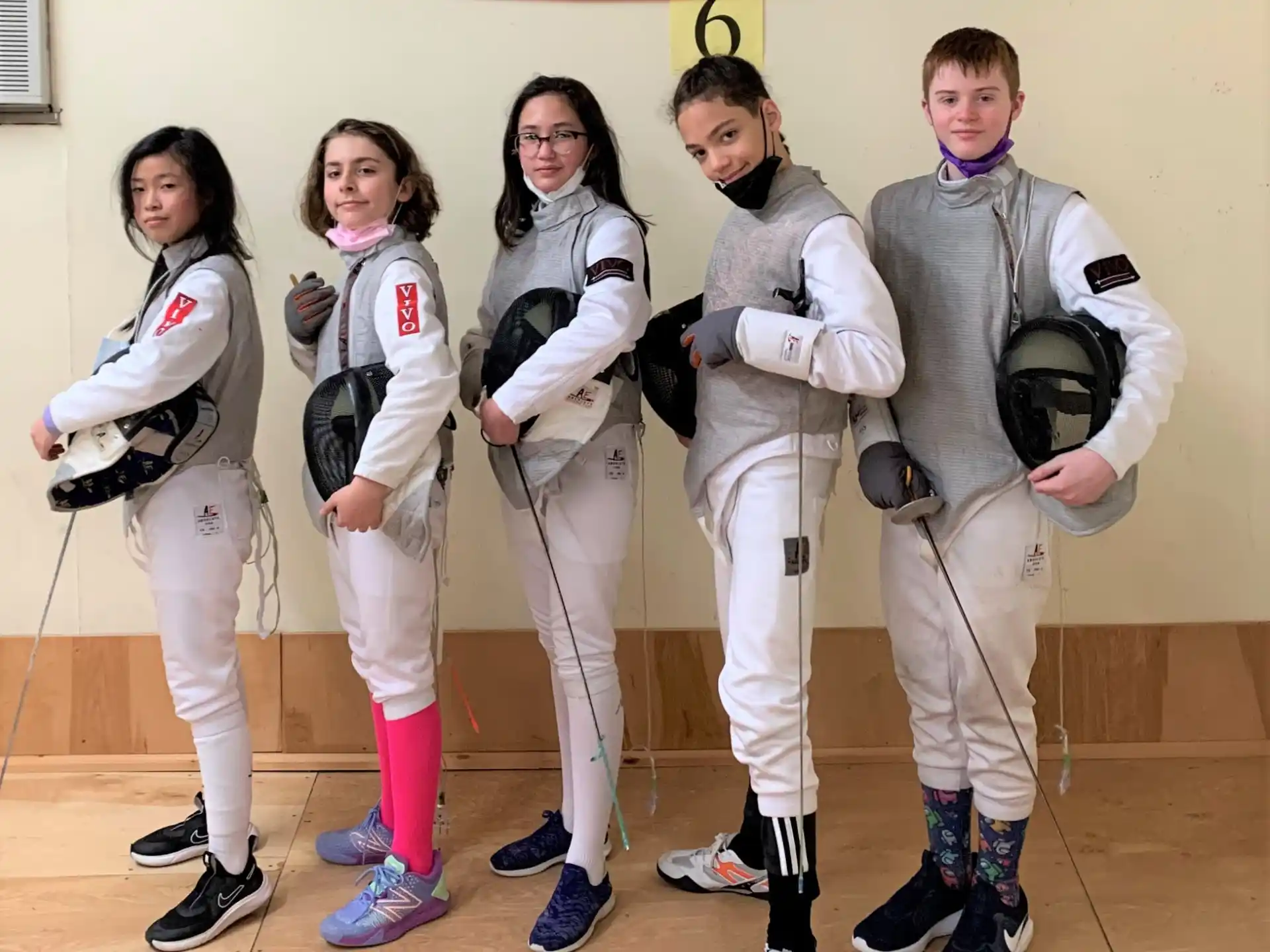 a group of people wearing matching outfits