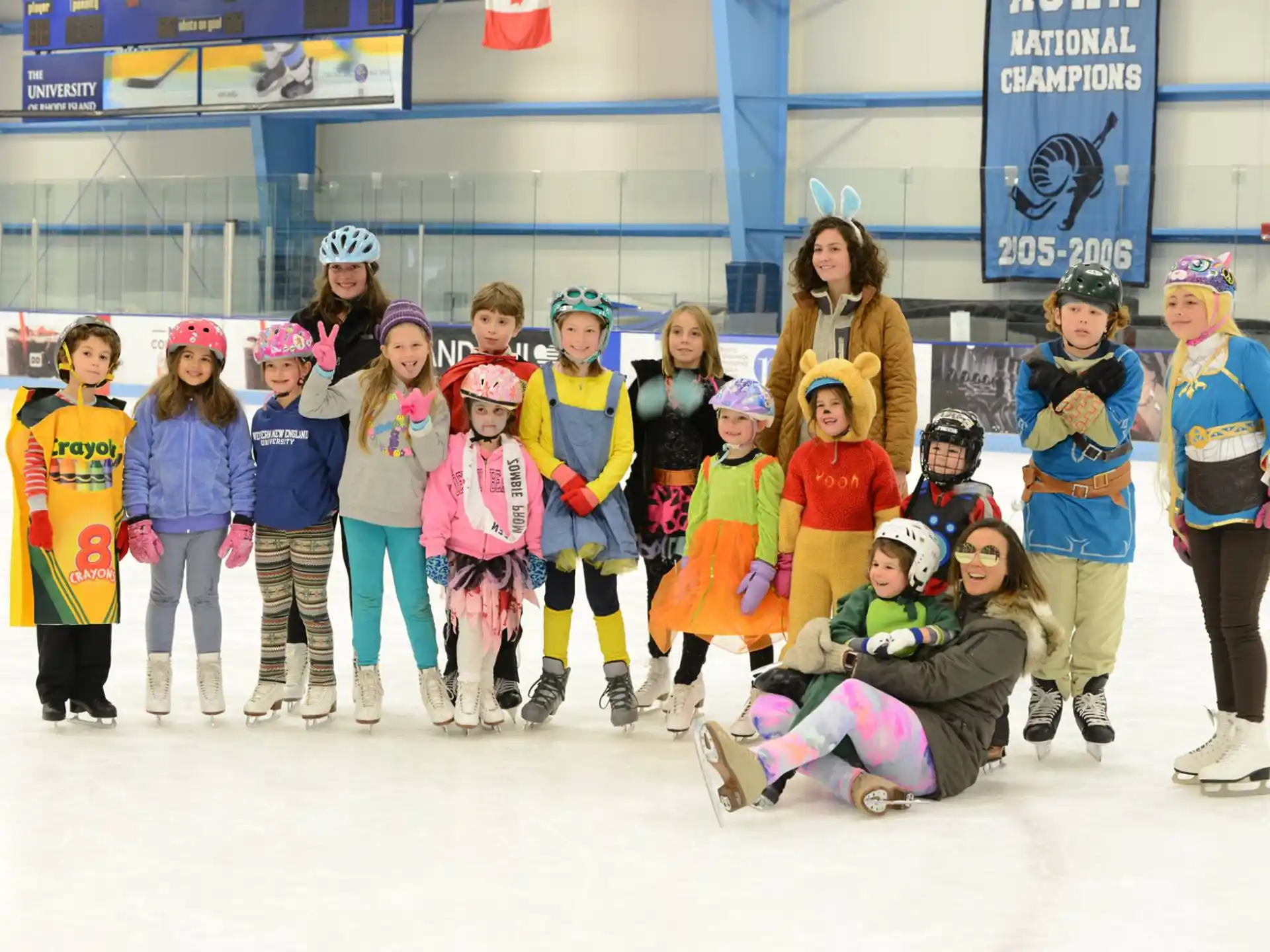 a group of people posing for a photo on ice