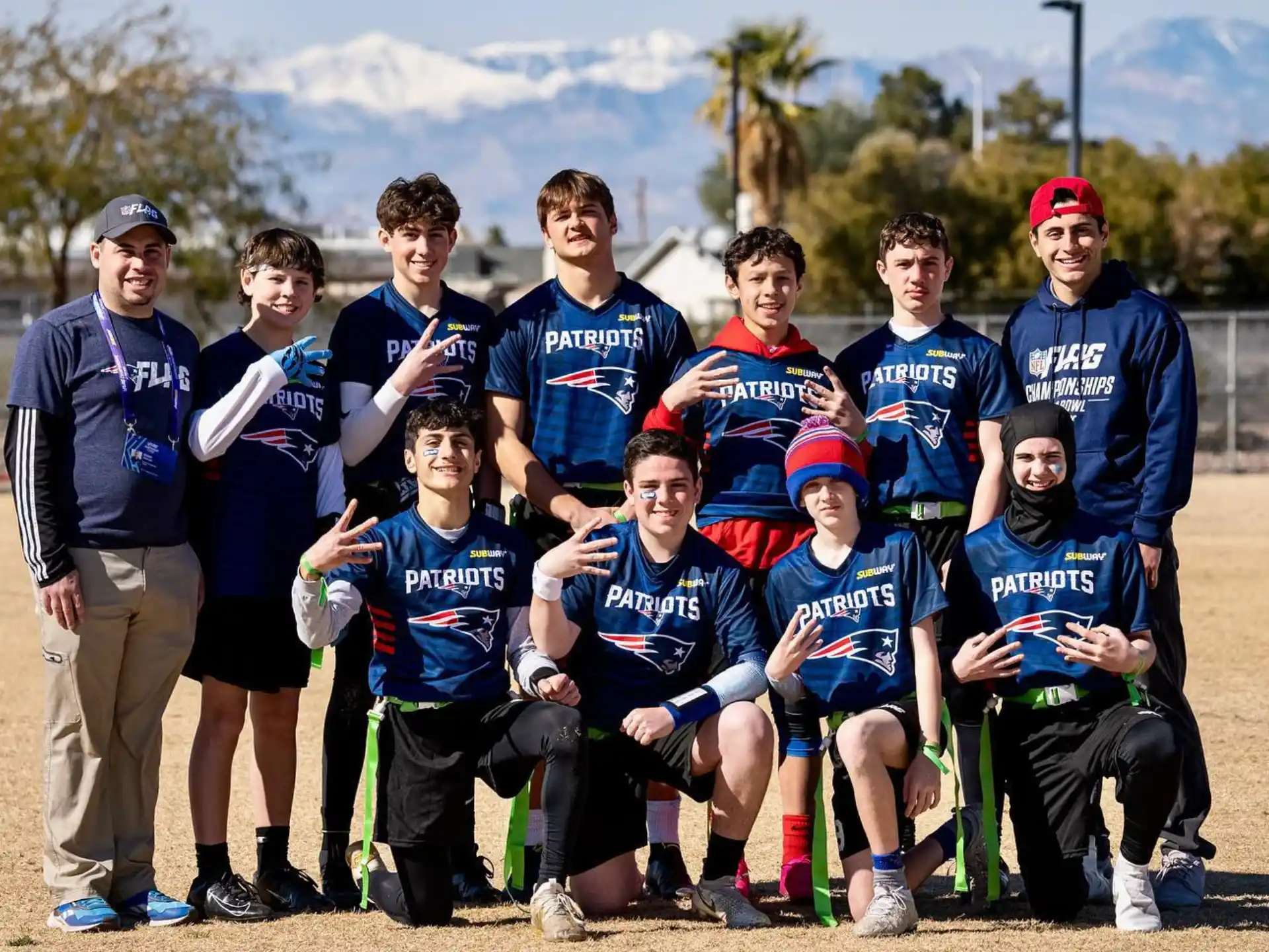 a group of boys posing for a picture