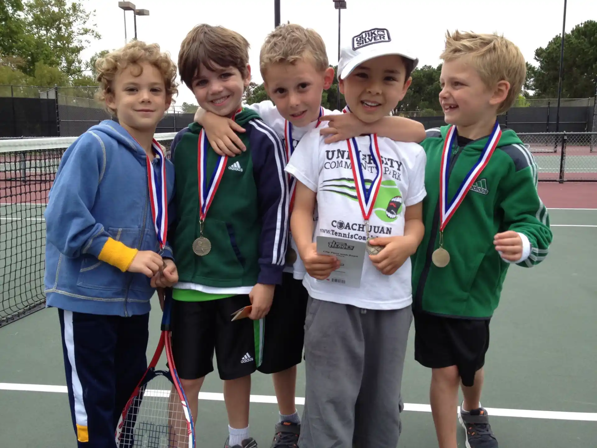 a group of boys posing for a picture