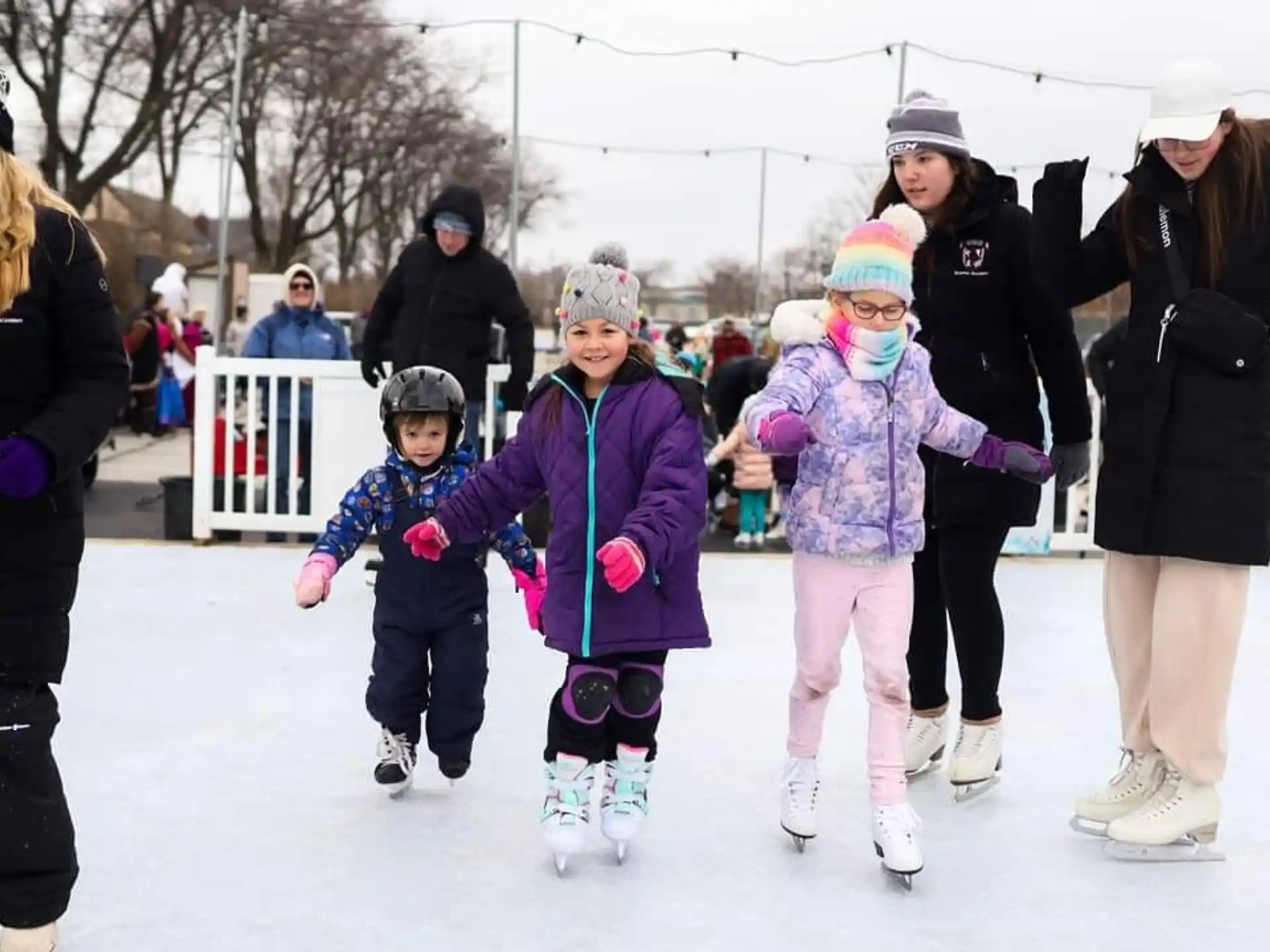 a group of people ice skating