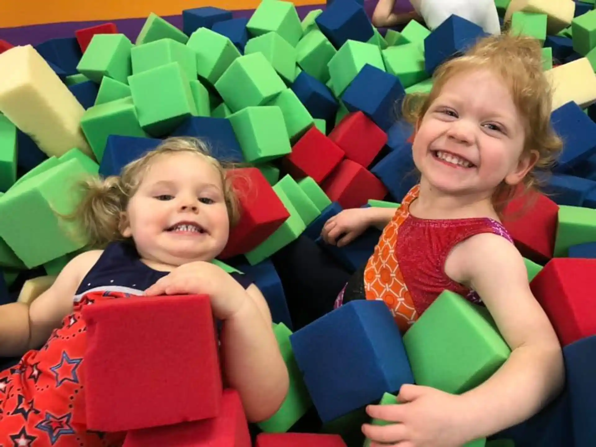 a couple of children in a ride