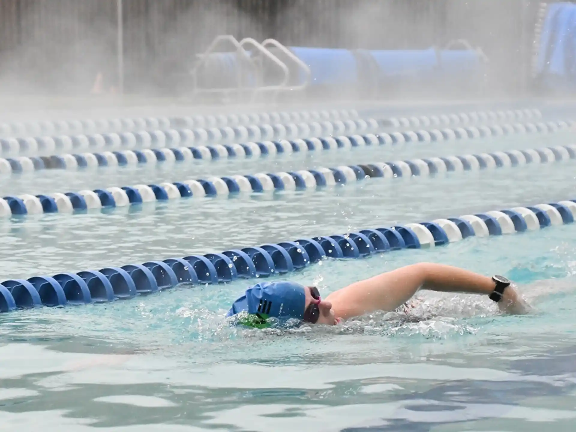 a person swimming in a pool