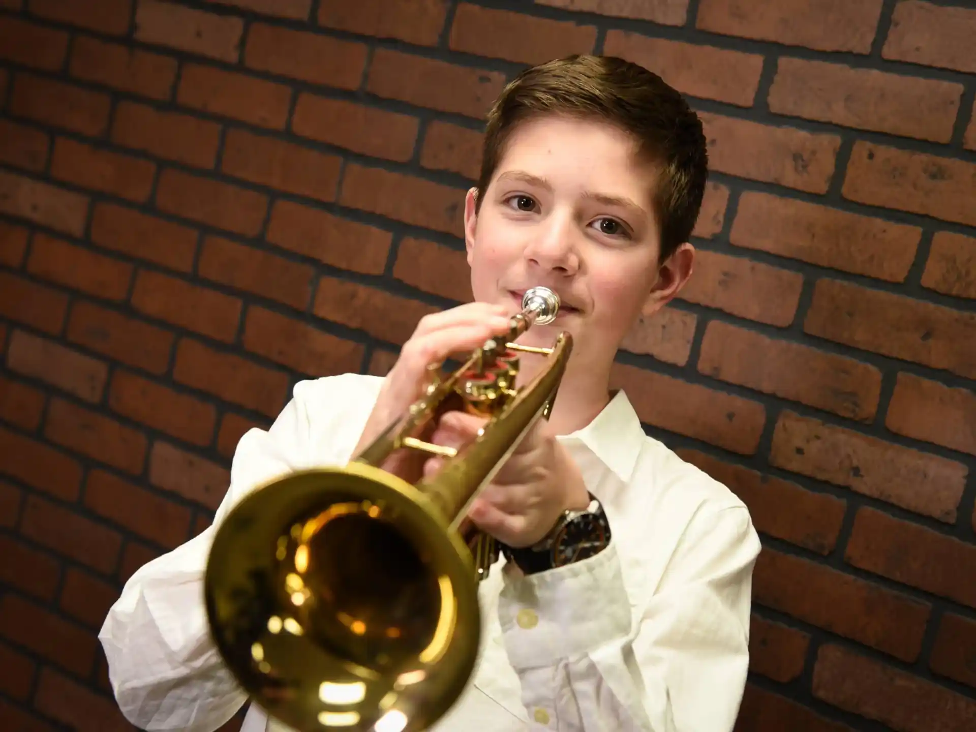 a person playing a trumpet