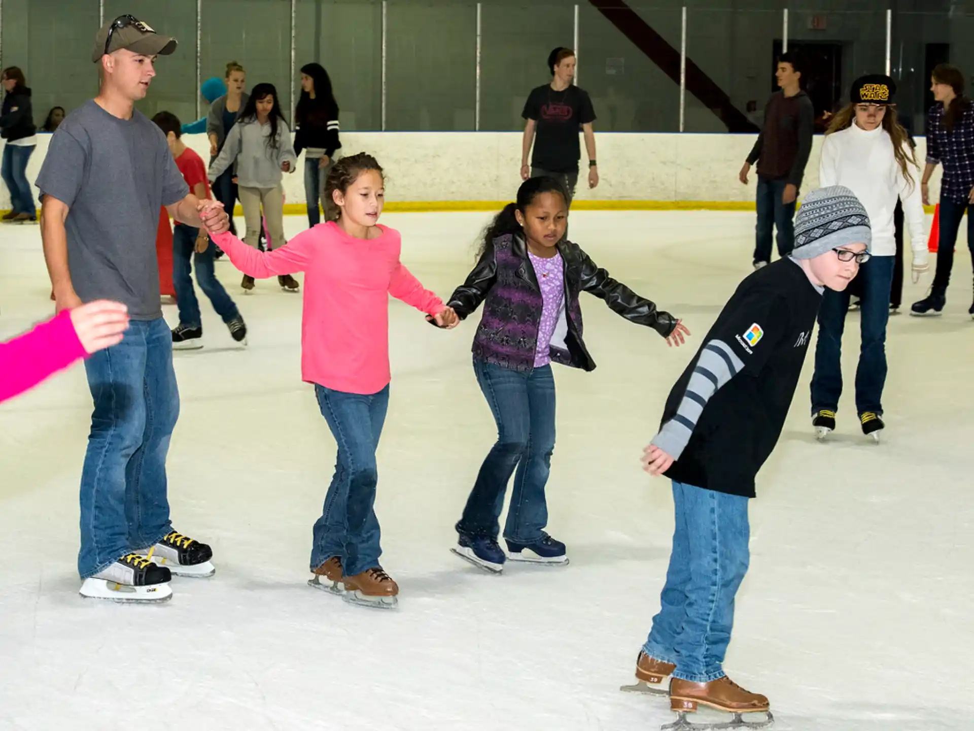 a group of people ice skating