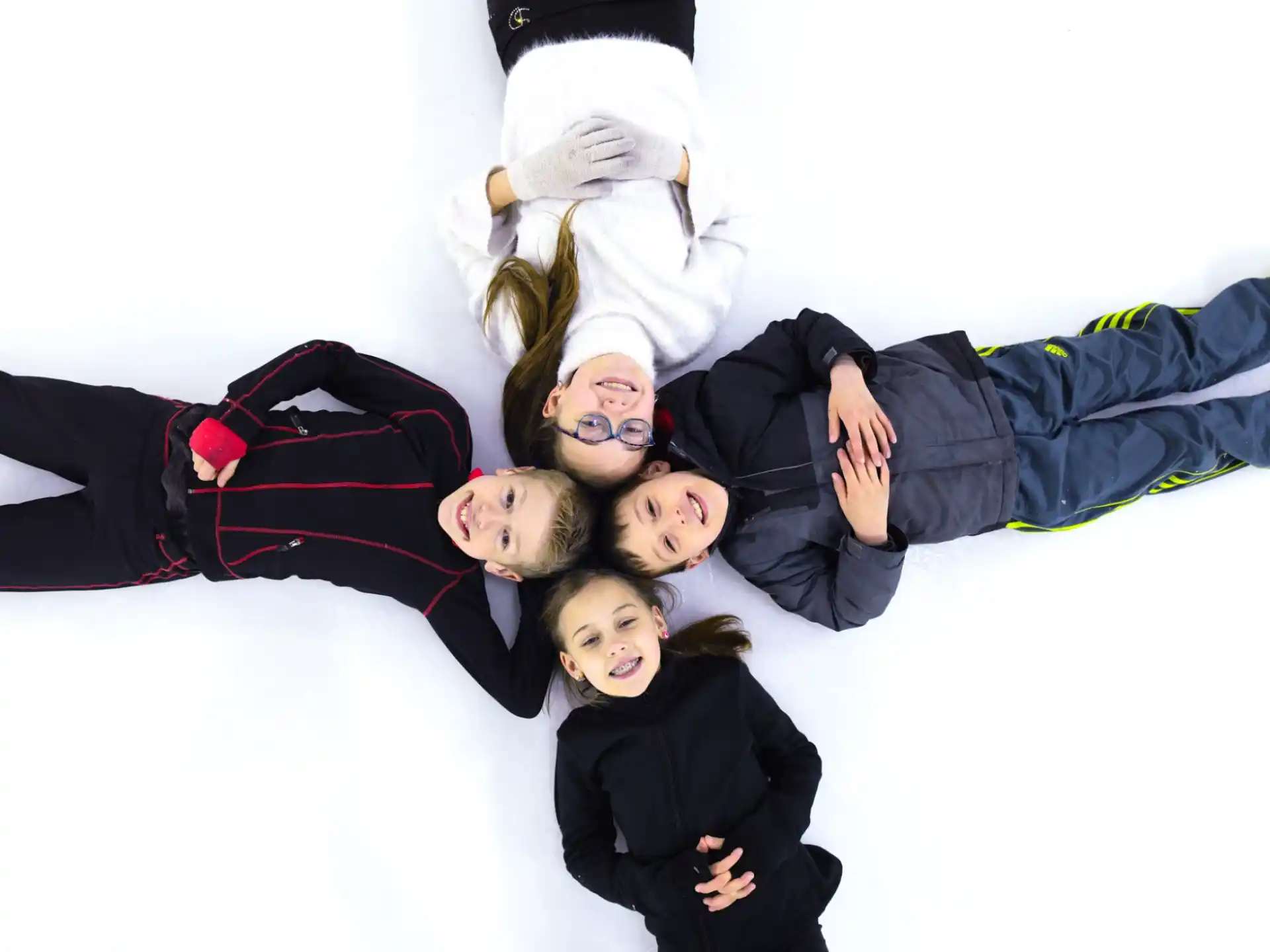 a group of women lying on the ground