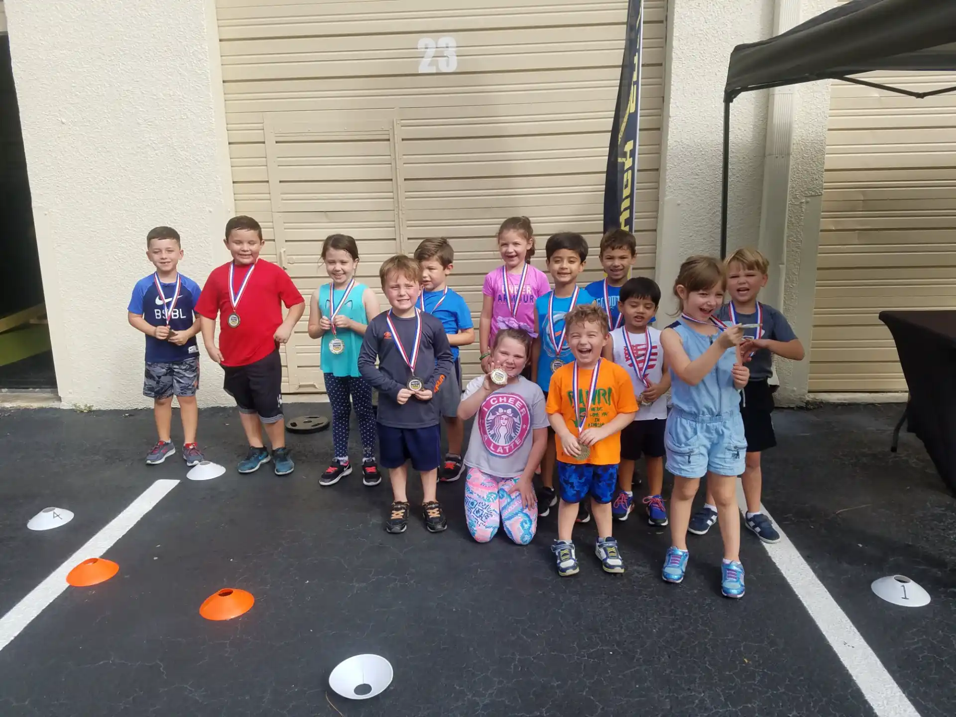 a group of kids posing for a photo